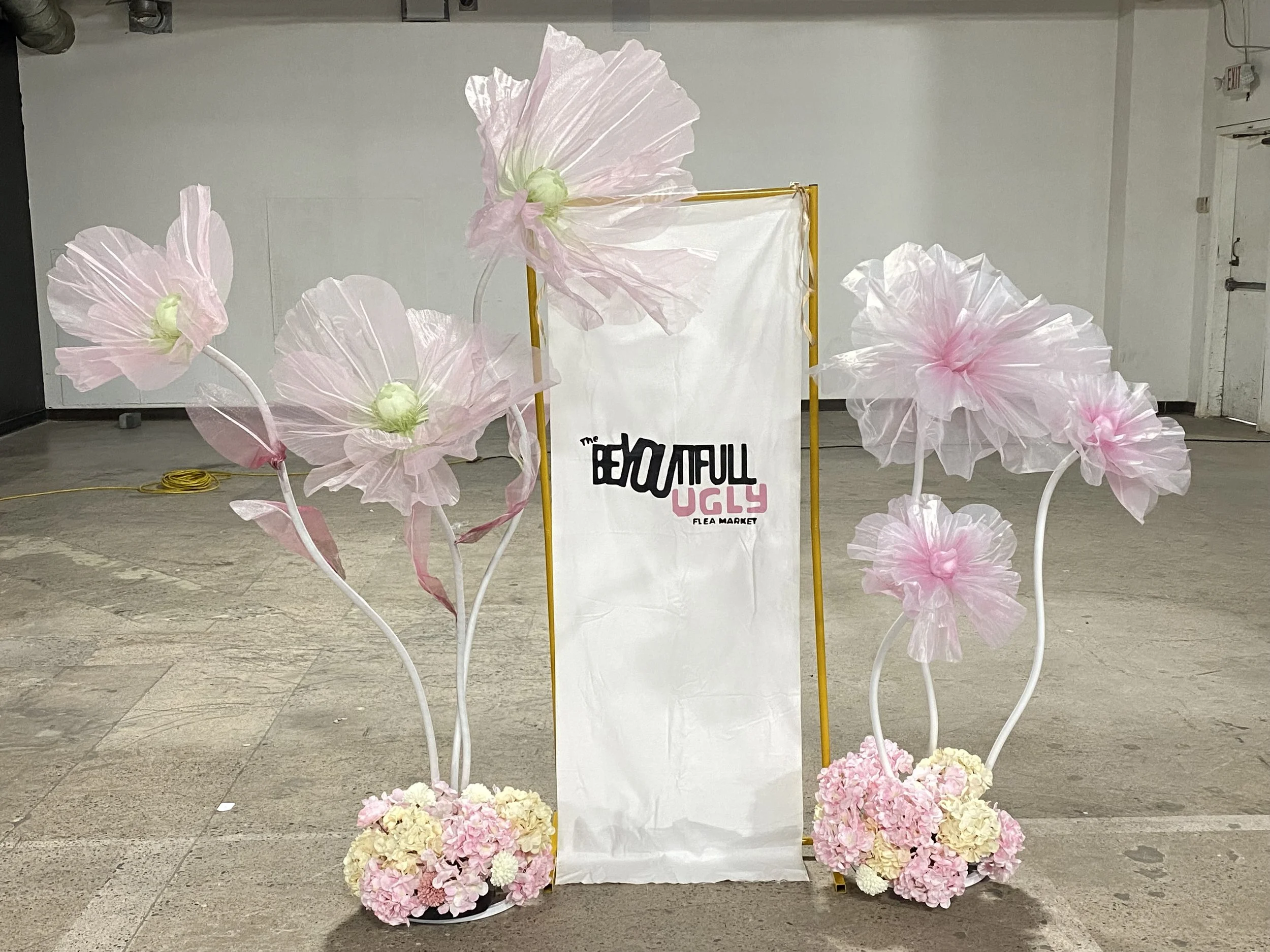 Custom Fabic Signage with Giant pink flowers