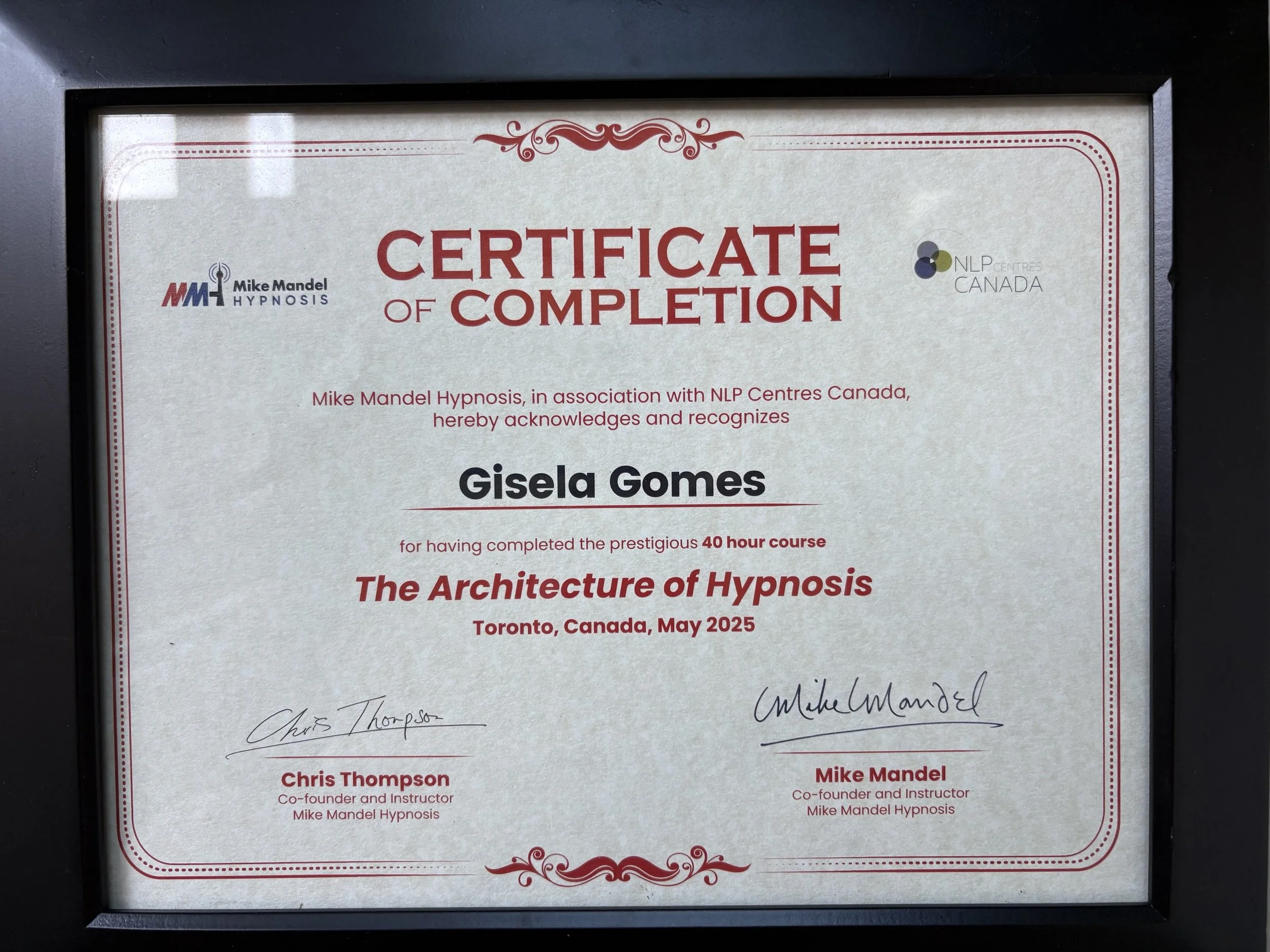 Certificate of completion awarded to Gisela Gomes for completing the 40 hour course on the Architecture of Hypnosis, presented by Mike Mandel Hypnosis in Toronto, Canada, May 2025, with signatures from Chris Thompson and Mike Mandel.
