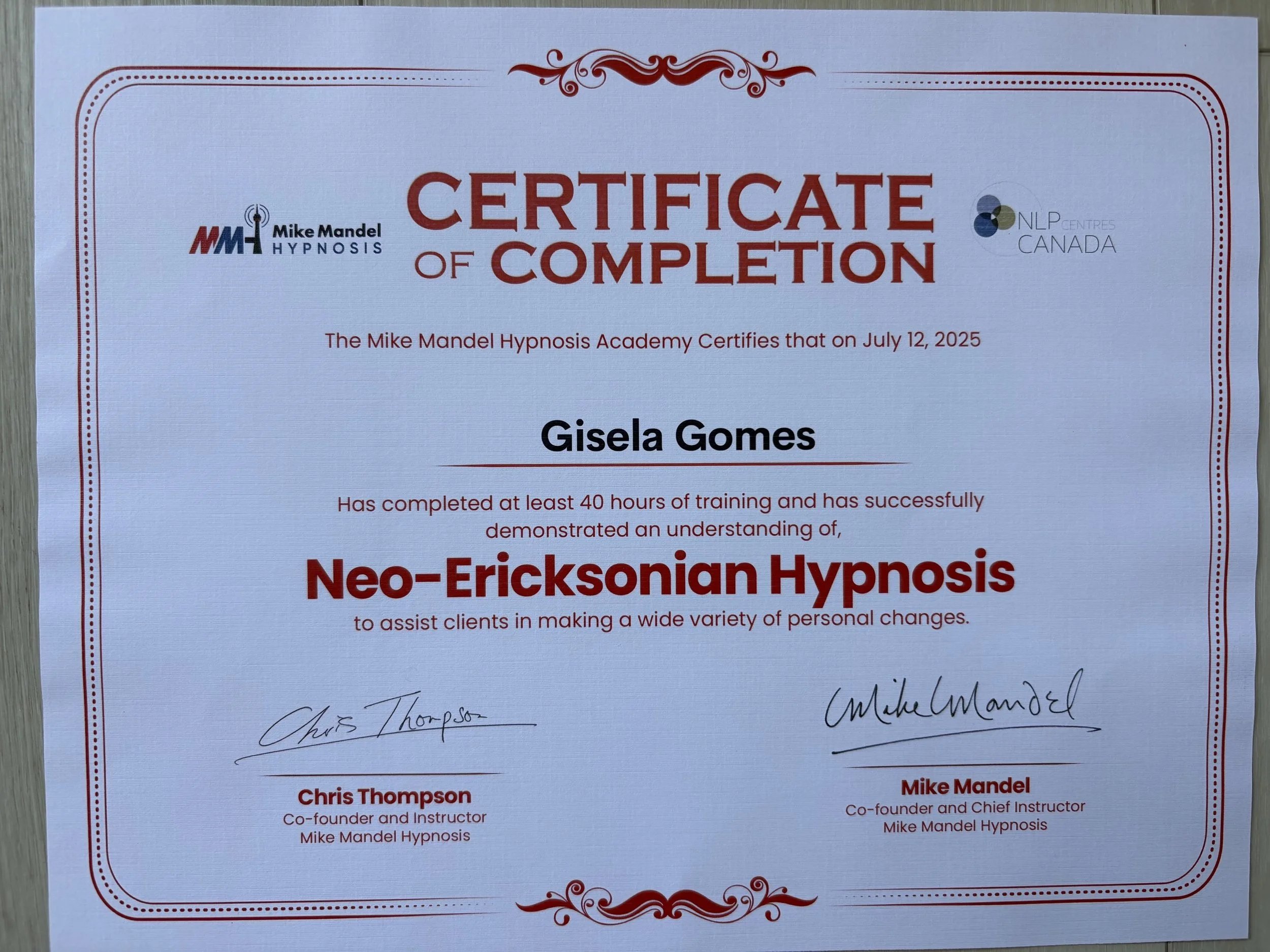 Certificate of completion for Gisela Gomes from Mike Mandel Hypnosis, dated July 12, 2025, with signatures from Chris Thompson and Mike Mandel.