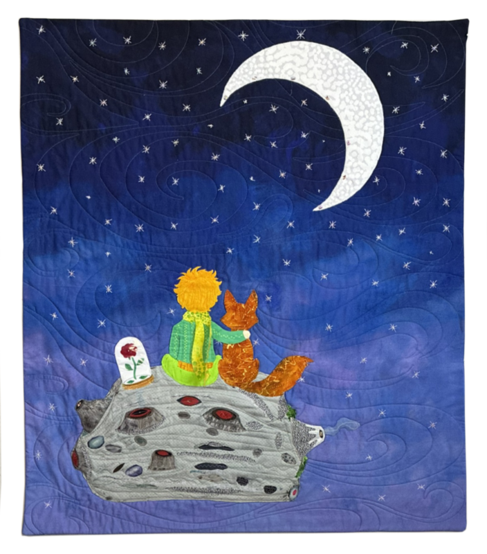 A quilt depicting a scene of a child with orange hair and a green coat sitting on a grey rock with a red fox, under a starry night sky with a crescent moon.