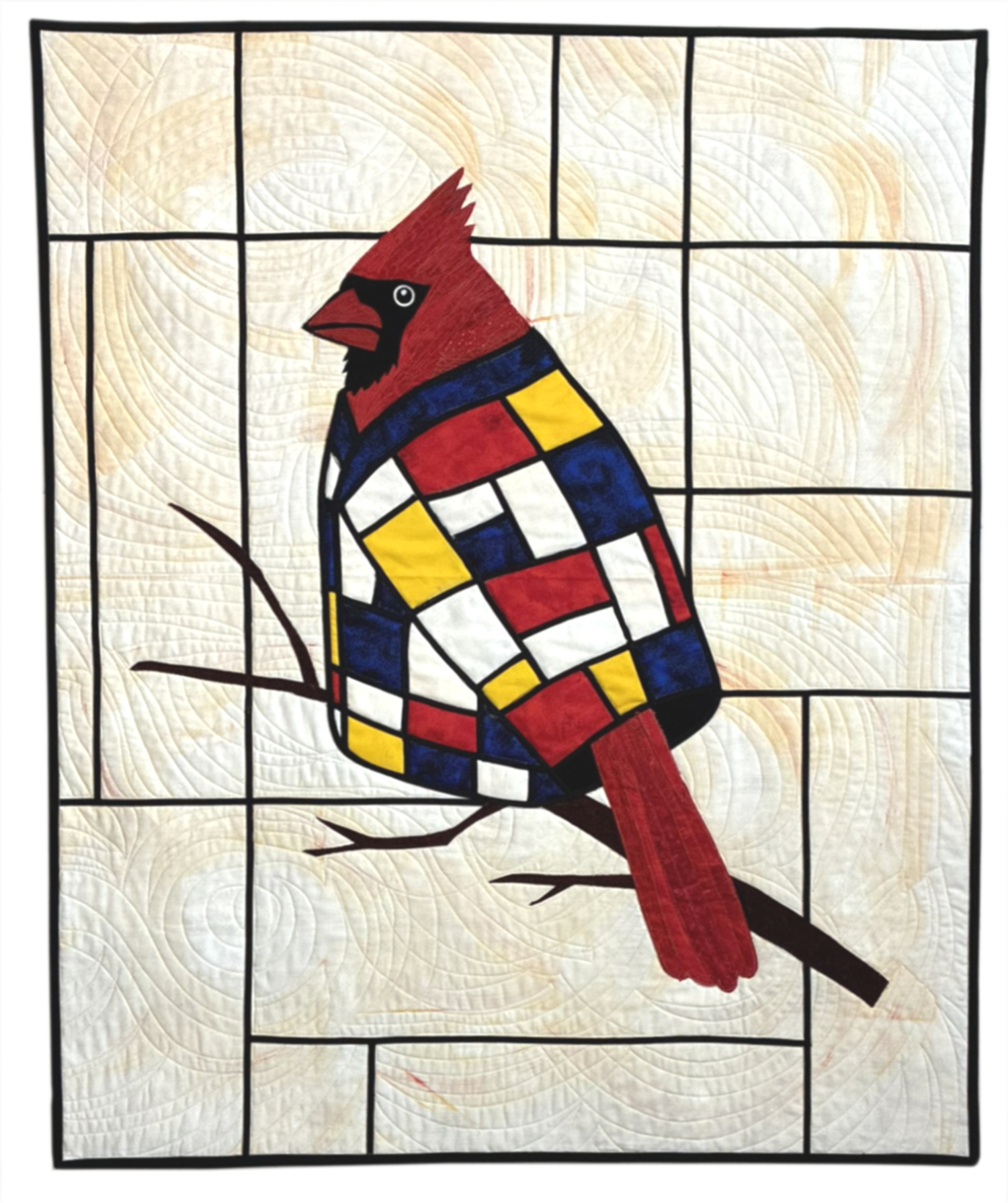 A quilted textile artwork of a colorful cardinal bird on a branch, with a geometric design and a cream-colored background.