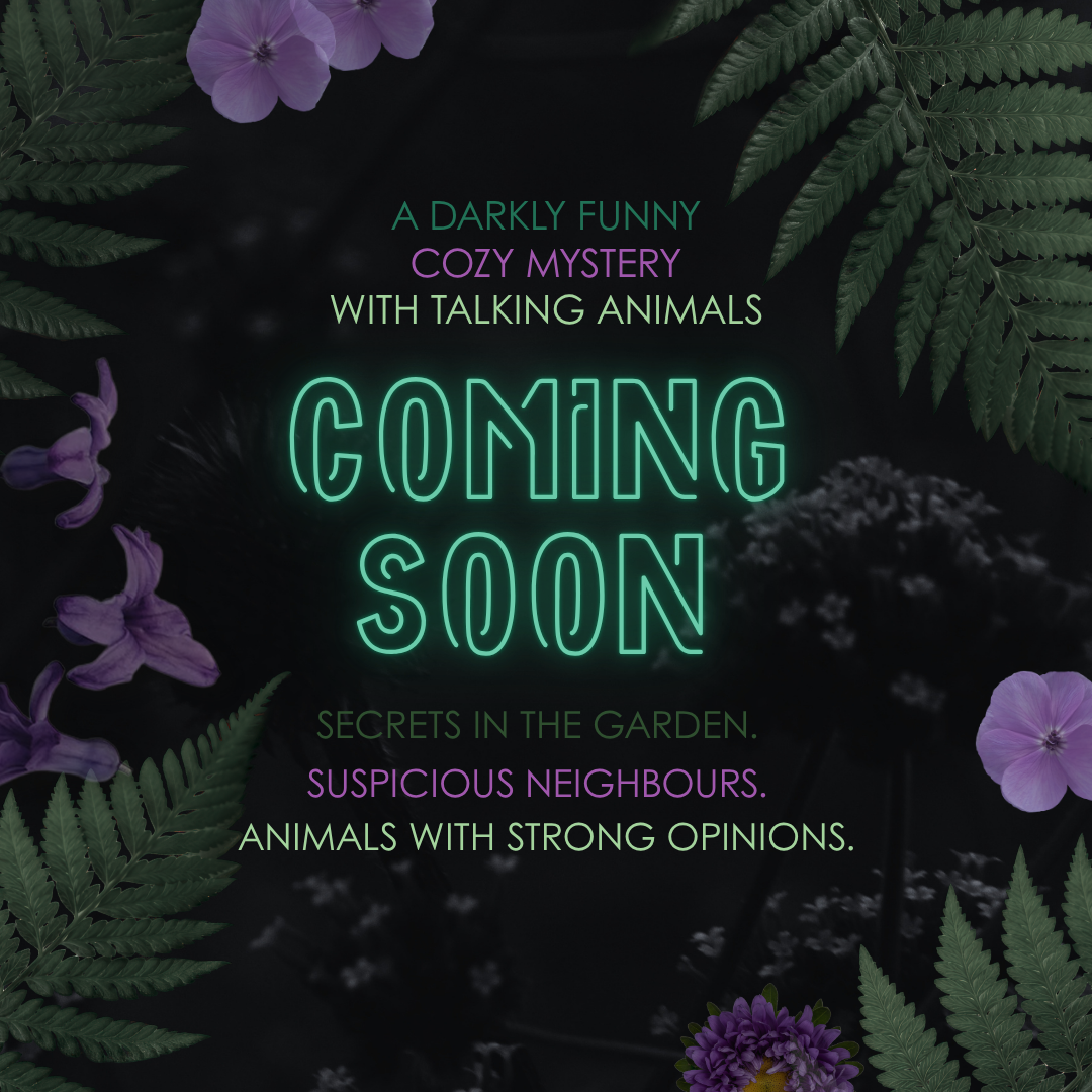 A promotional graphic with a dark background and green fern leaves, featuring purple flowers and neon-style text that reads 'Coming Soon' with additional text about a darkly funny cozy mystery with talking animals.