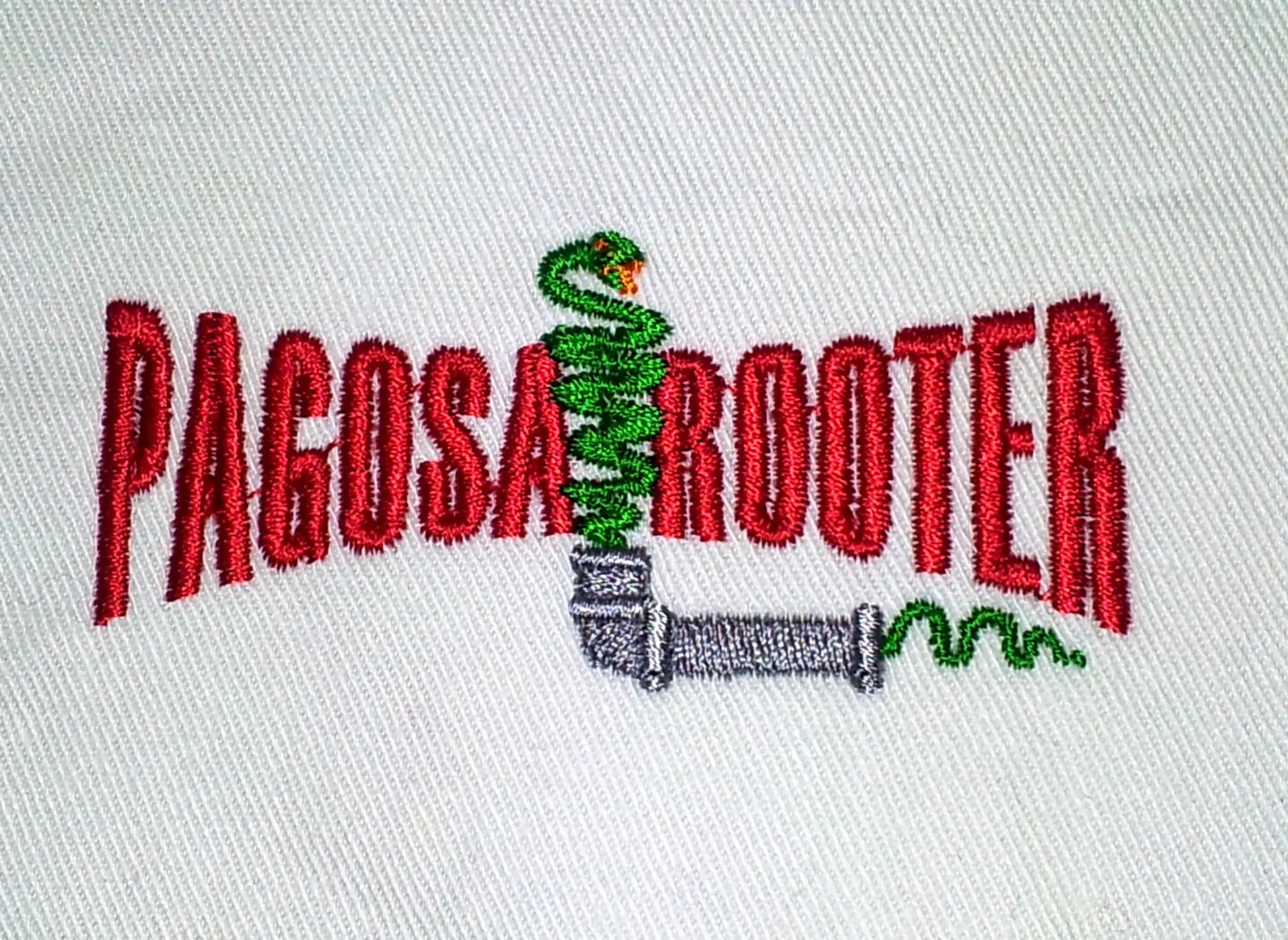 Custom hand digitized logo embroidery for Pagosa Rooter workwear.
