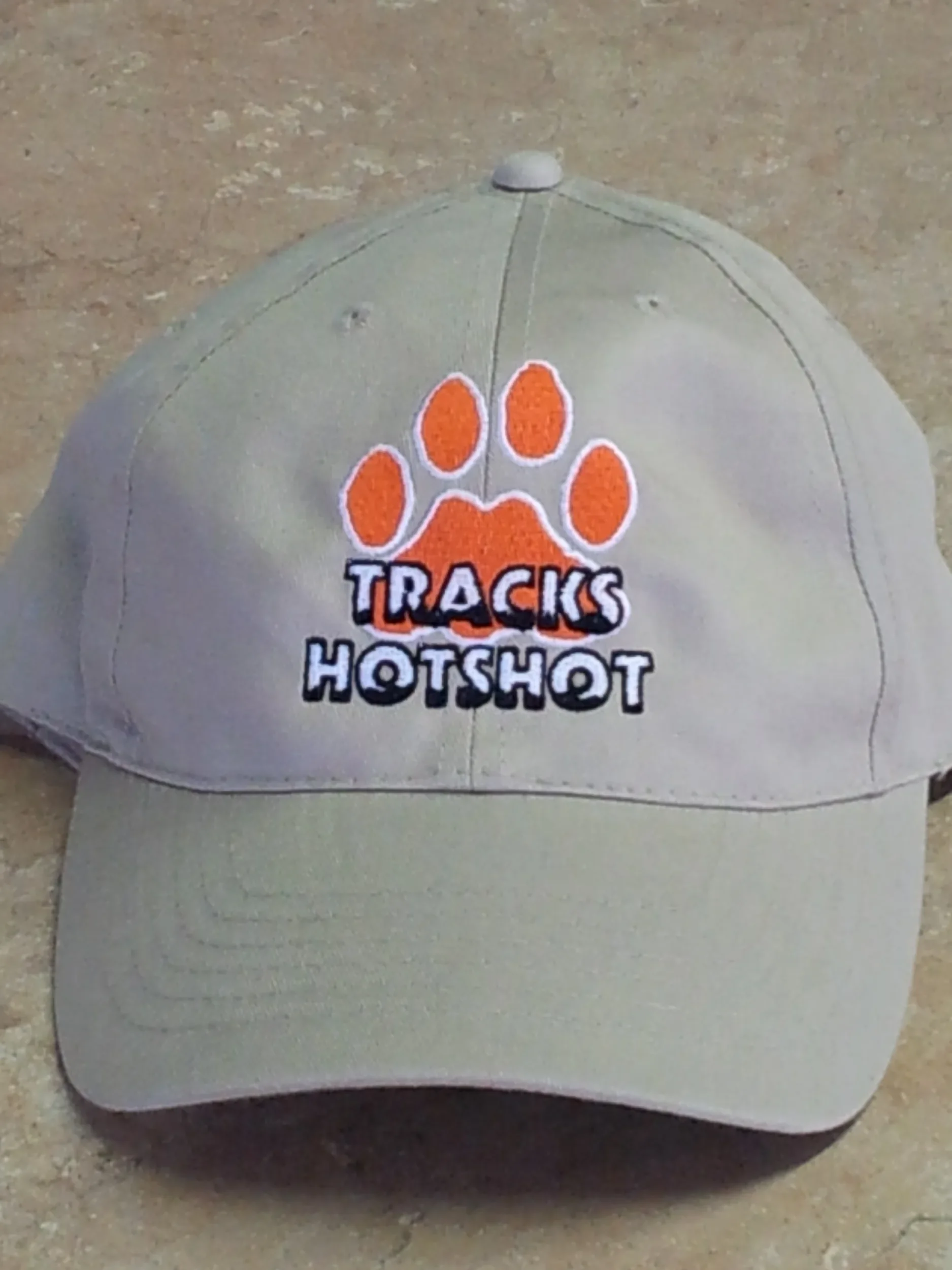 Custom hand digitized custom embroidery for Tracks Hotshot caps.