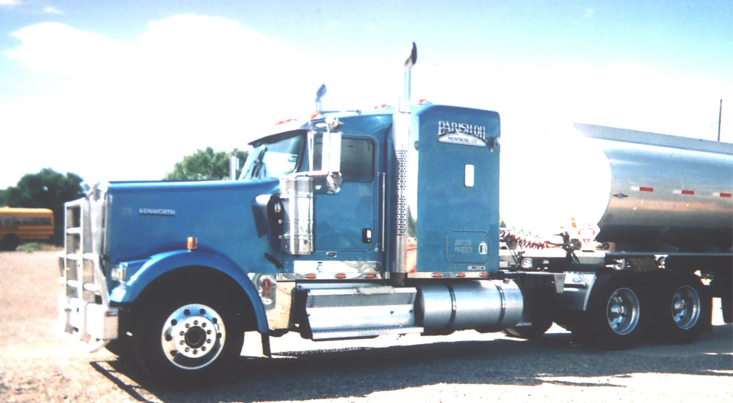 Image of the blue semi truck used for in house digitizing for custom embroidery.