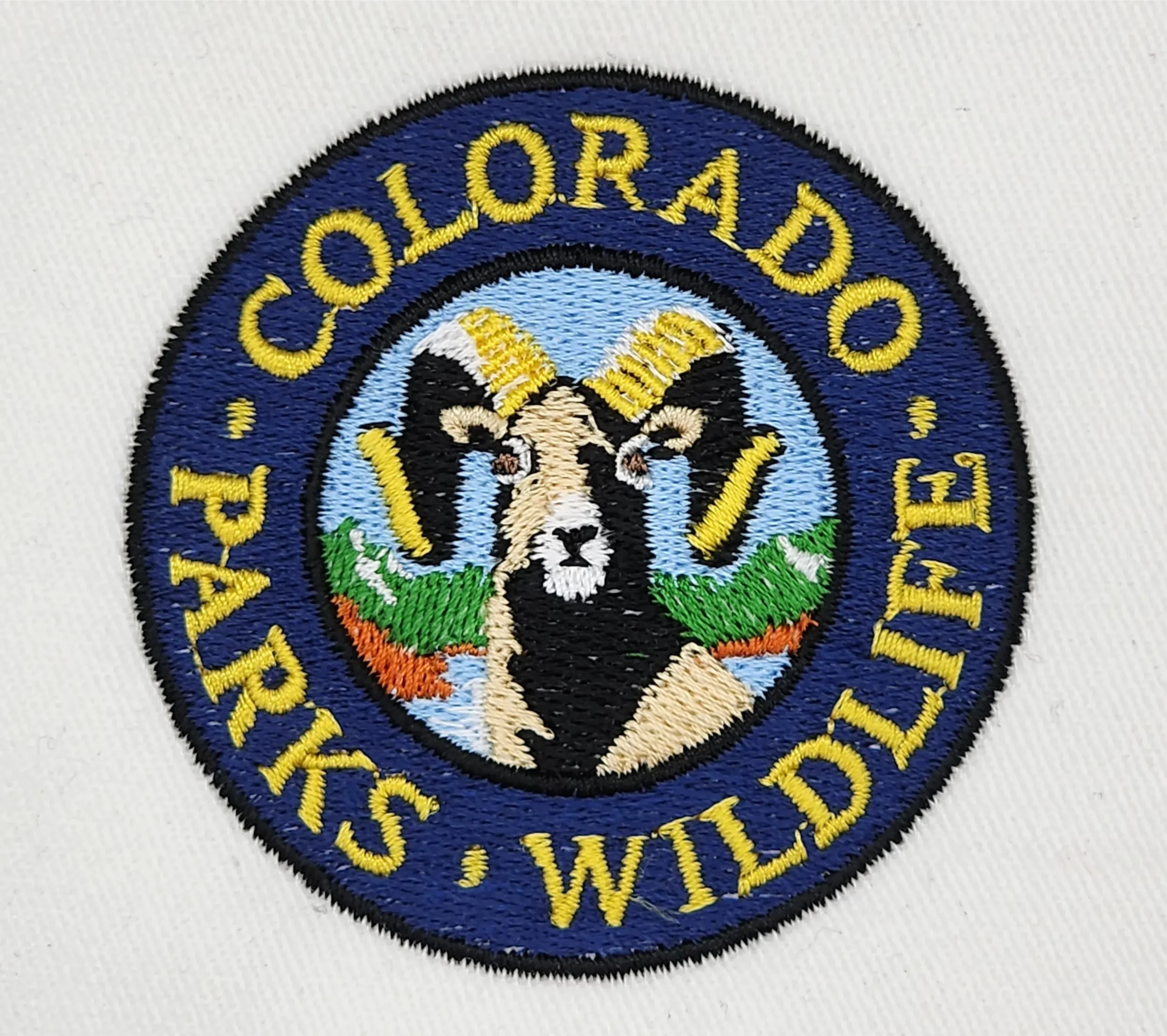 Custom hand digitized official patch embroidery for Colorado Parks and Wildlife shirts and hoodies.