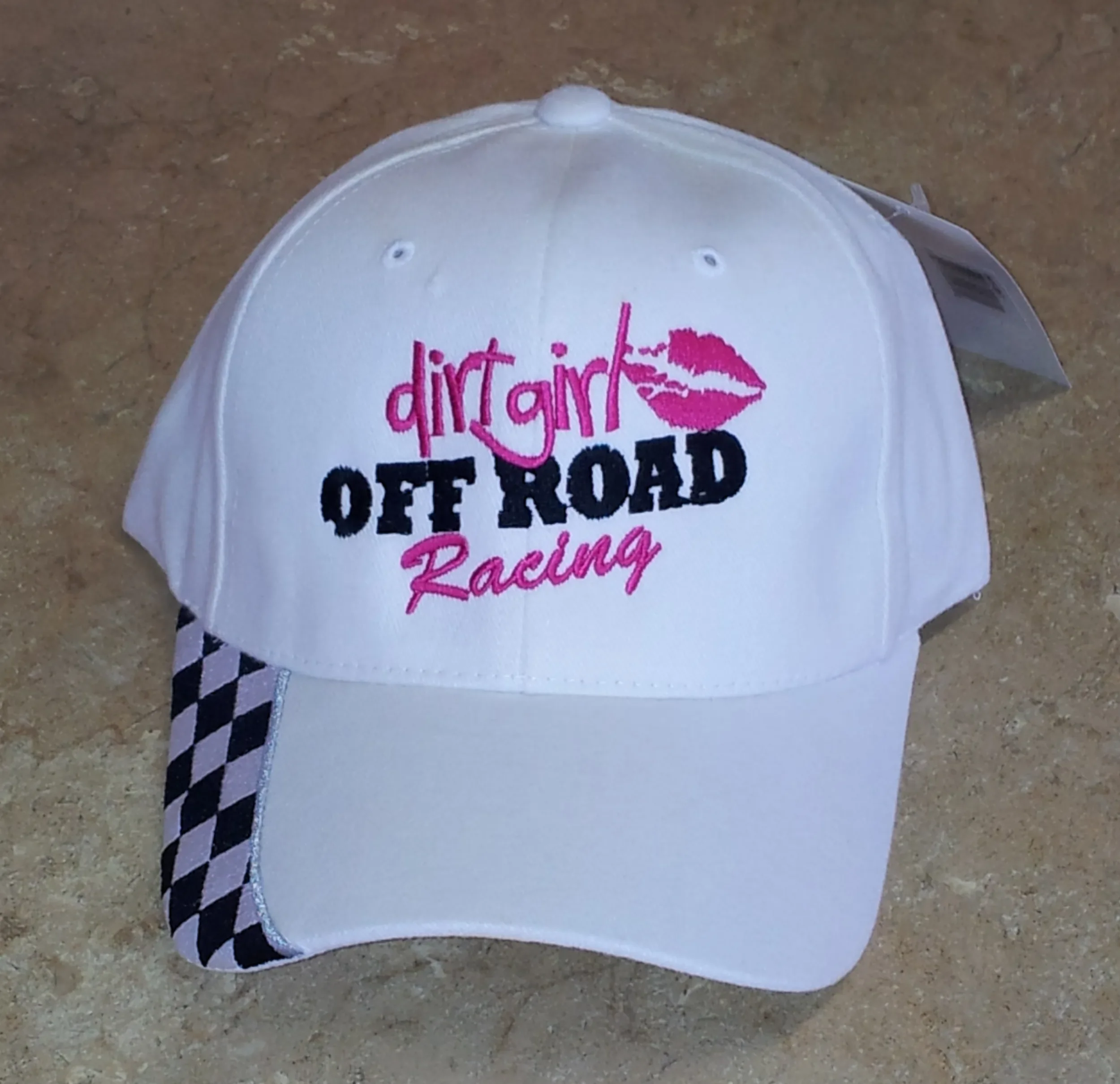 Hand digitized Dirt Girl Off Road logo embroidered on baseball cap.