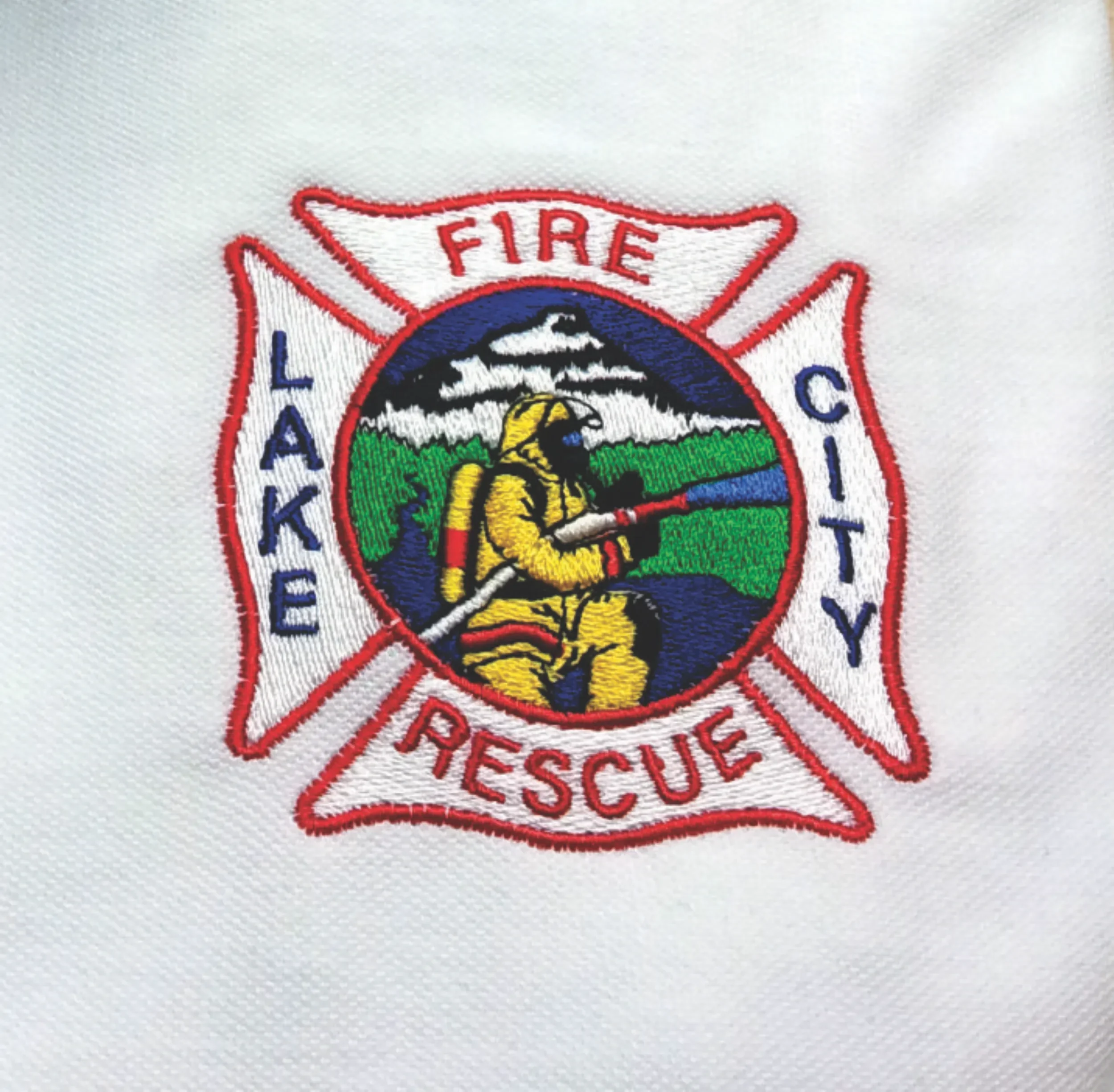 Custom hand digitized official insignia patch embroidery for Lake City Fire Department.