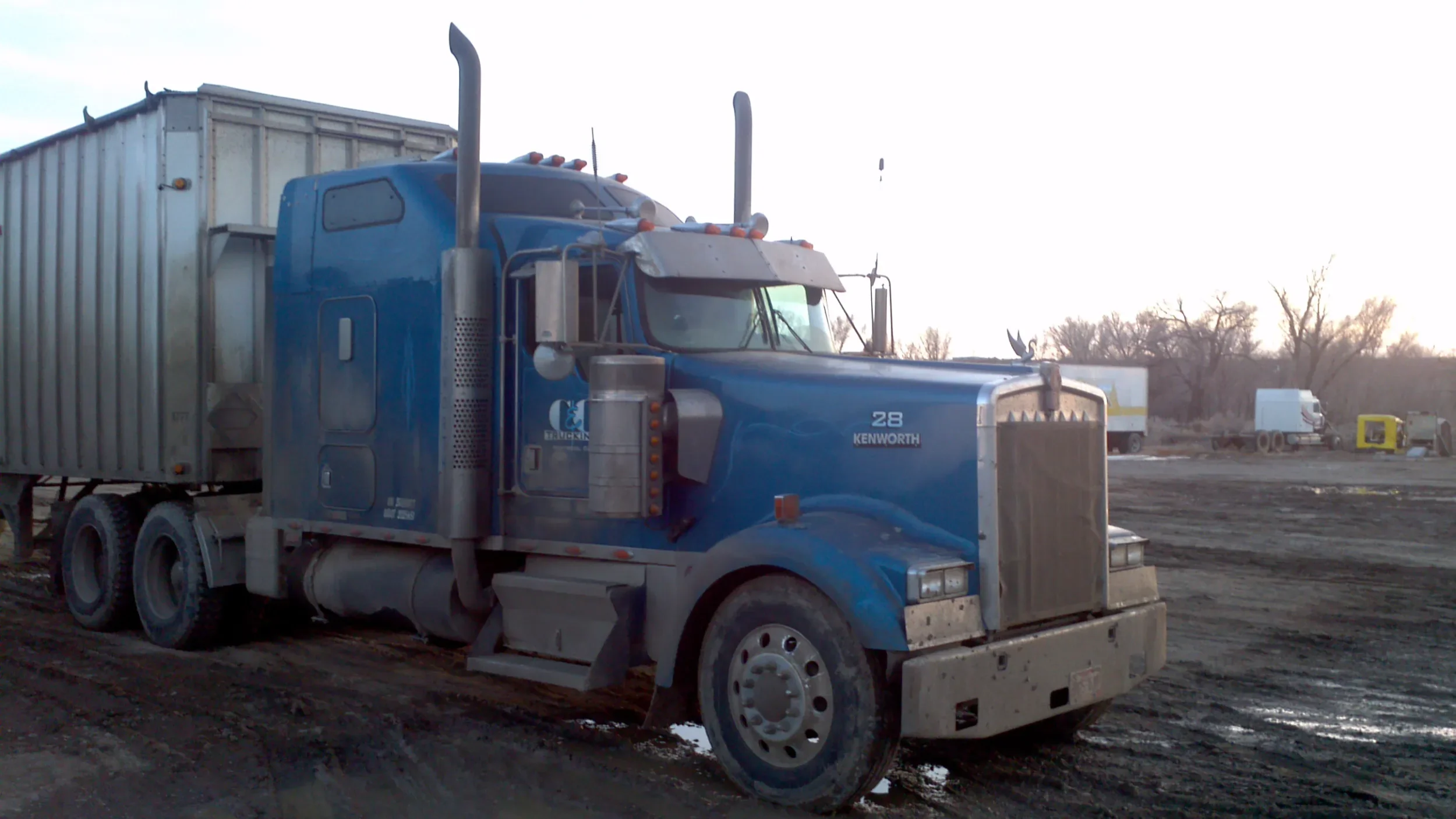 Image of blue semi-truck used for hand digitize embroidered jacket back.