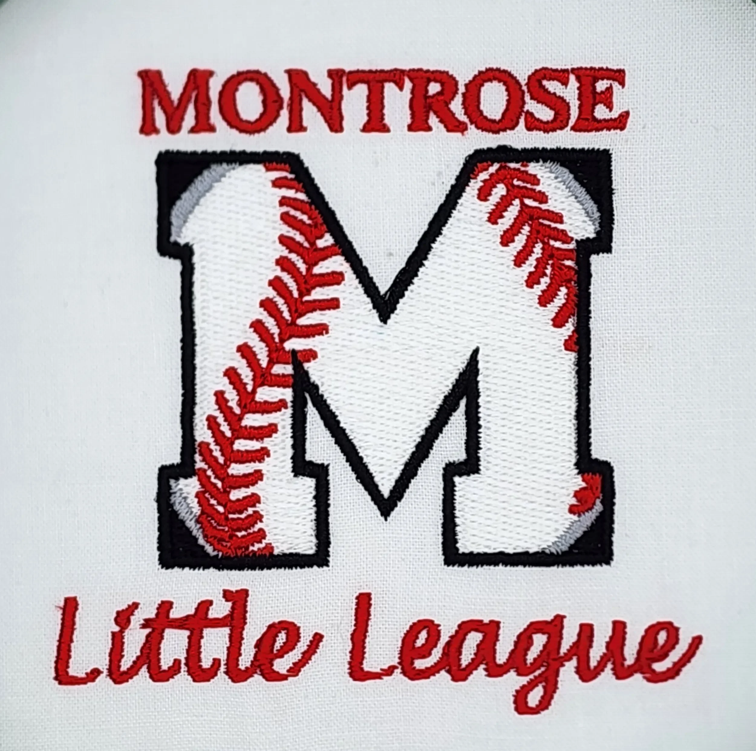 Hand digitized Montrose Little League embroidery for youth uniforms and spirit wear.