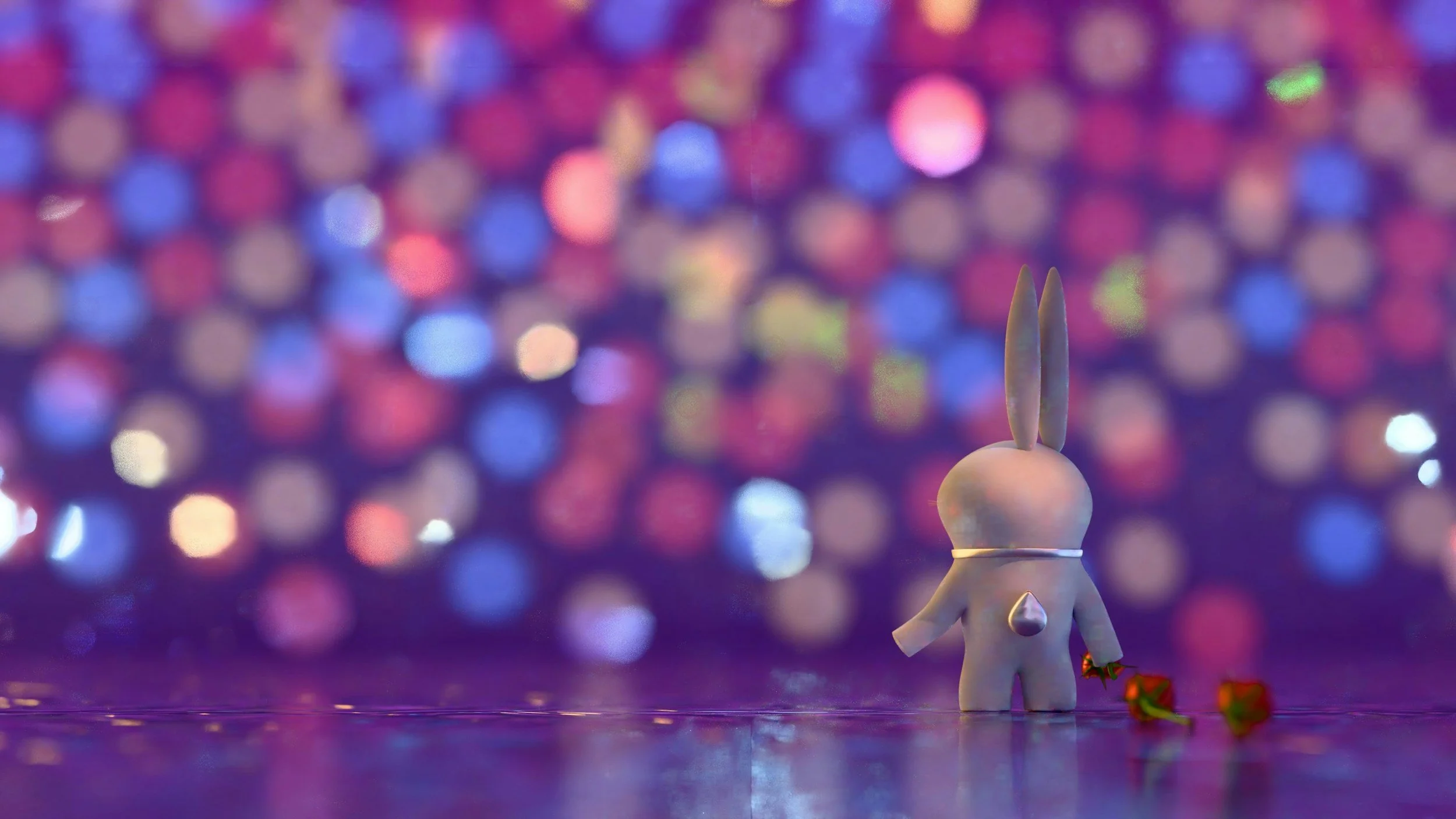 A small, white rabbit figurine made of plastic or ceramic, standing on a shiny surface, with pink and purple bokeh lights in the background. The rabbit is holding a small red rose and has two long ears.