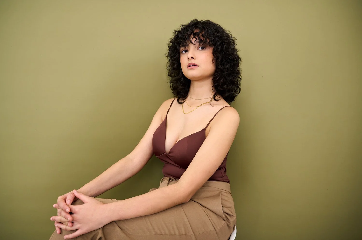 Dark curly hair with natural volume and definition