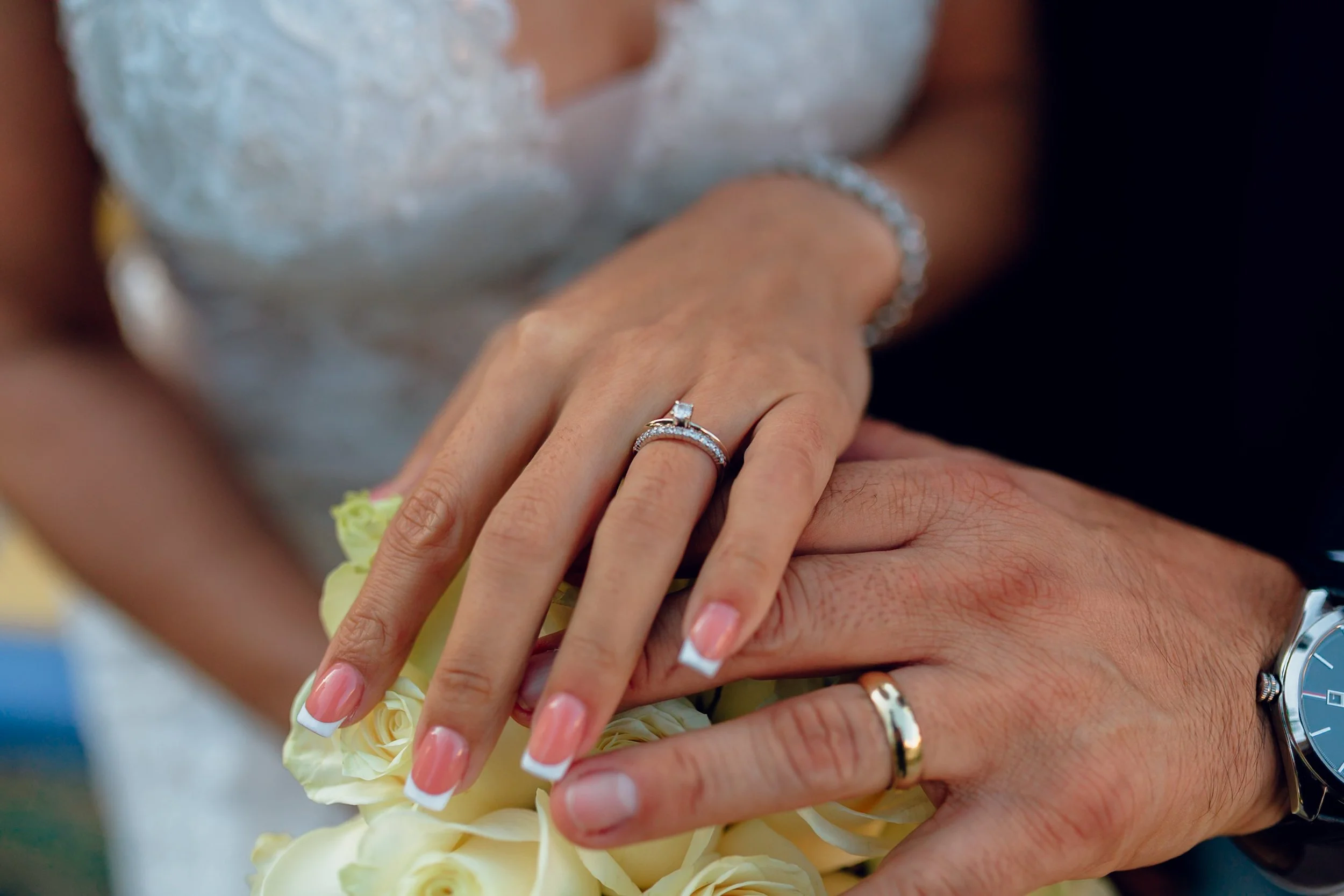 Close-up of wedding rings and bouquet, San Diego wedding details