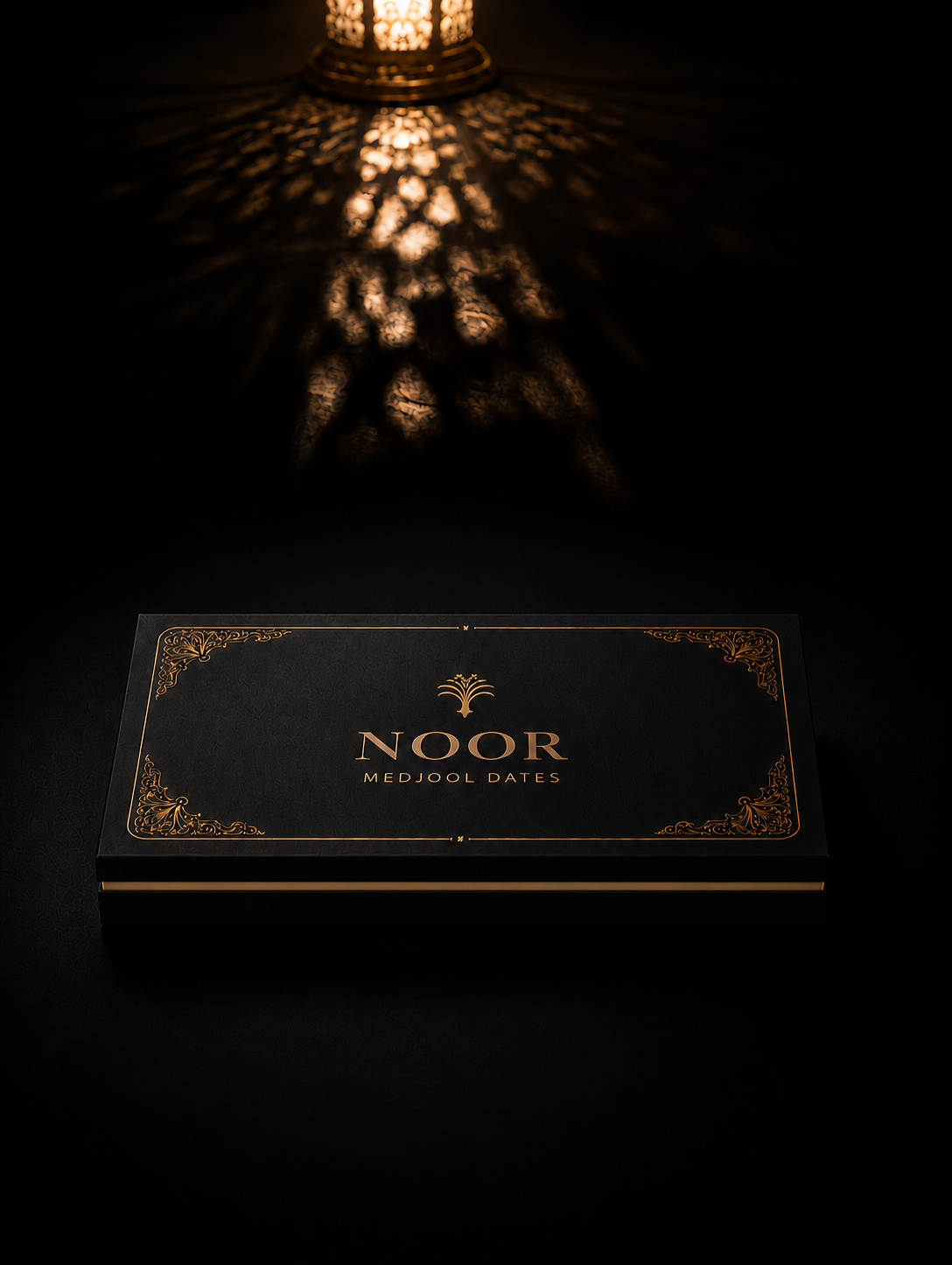 Overhead view of the rectangular NOOR Medjool date gift box