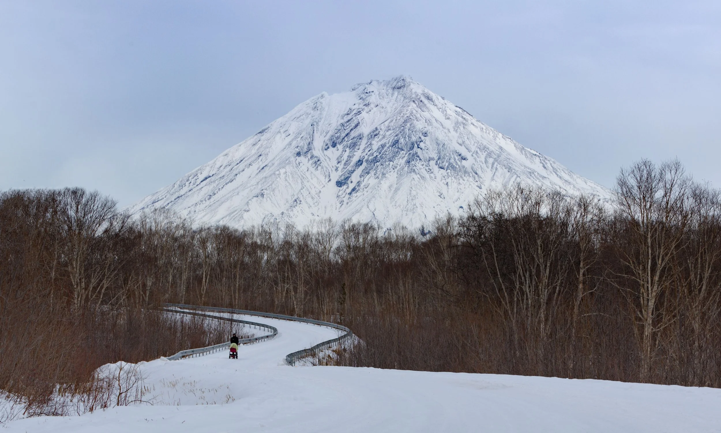 Snow-covered road leading toward Mount Yotei in Niseko, Hokkaido