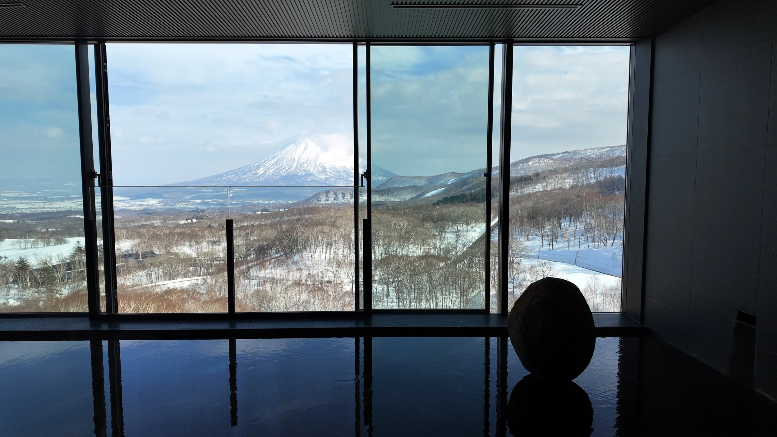 Kaba Niseko, a private 31-site onsen villa estate near Hanazono with panoramic Hokkaido mountain views. Contact Off-Market Niseko for current availability.