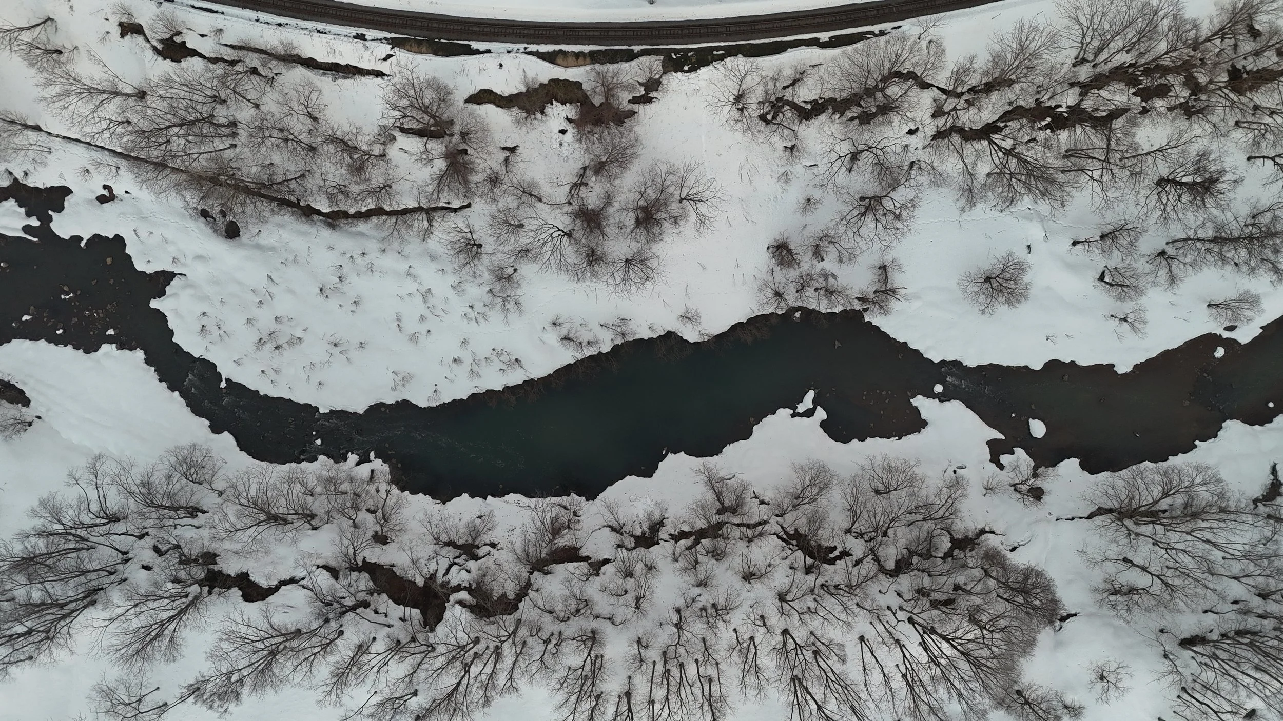 Kingfisher Trail Niseko, an exclusive 17-lot estate at the base of Lower Hirafu with direct Shiribetsu River access for fly-fishing. Available exclusively through Off-Market Niseko.