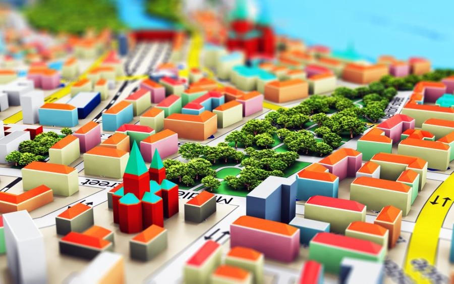 Colorful 3D model of a cityscape with buildings, green trees, and streets, viewed from above.