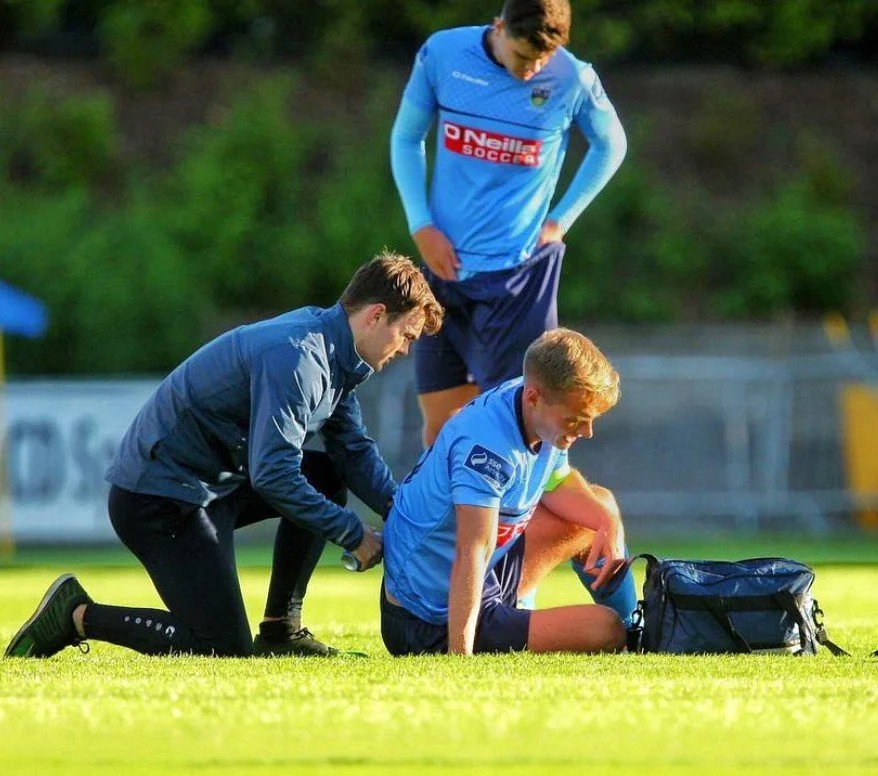 Senior Physiotherapist Morgan Sloggett from Flow State Physio in Sligo is seen here treating a professional soccer player for lower back pain who is playing for UCD Football Club.