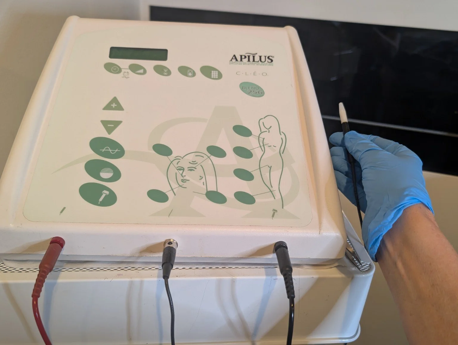 Advanced Electrolysis machine and fine treatment probe held by Sarah Hurst at her Brighton clinic.
