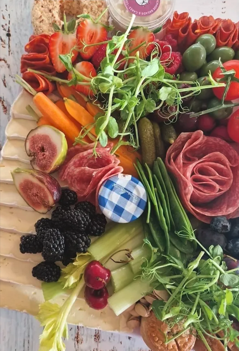 Freshly prepared local produce including Cote Hill Cheeses on a platter at Bridleway Retreat