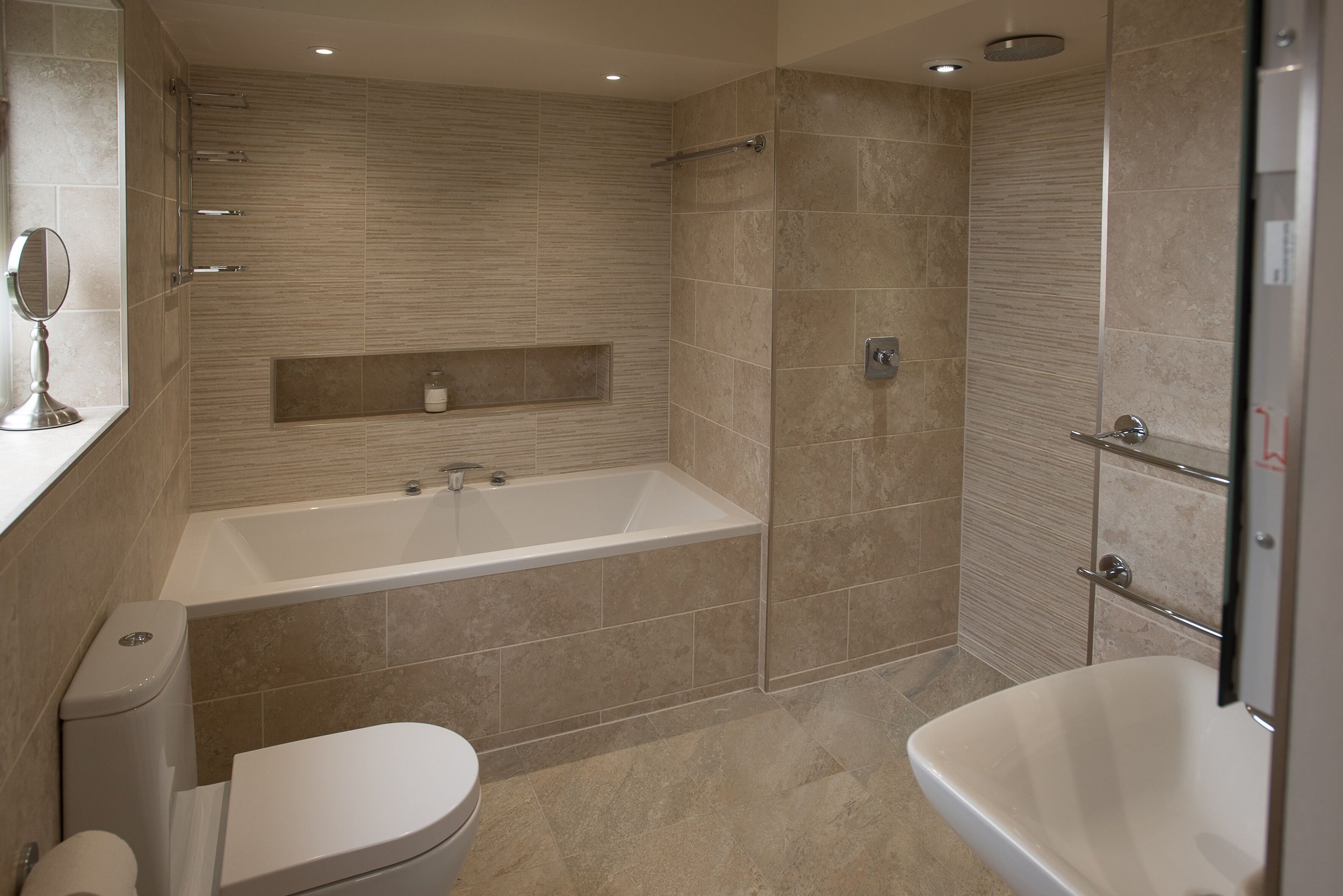 The en-suite in the Garden Room with a bath and drench shower