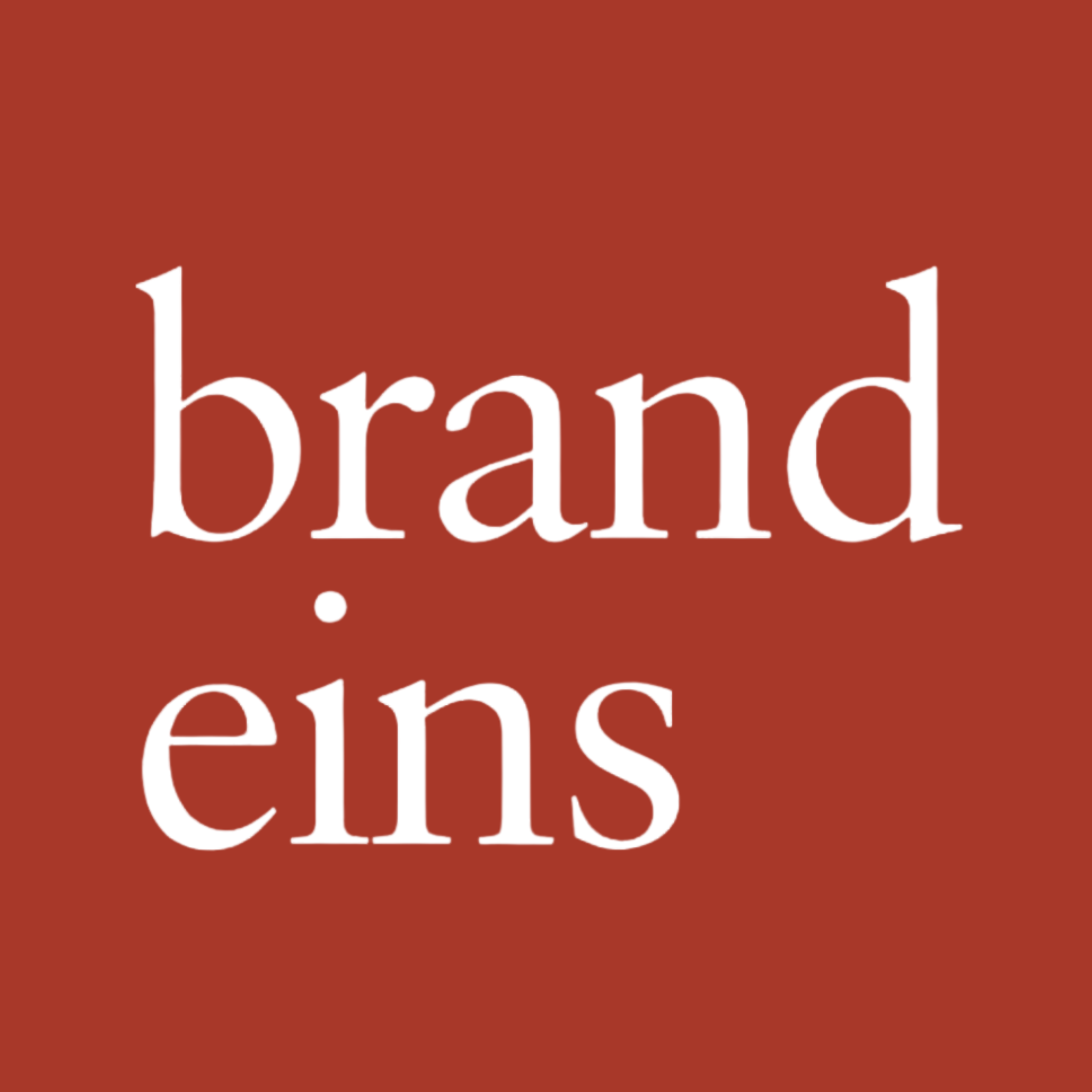 Close-up of a book cover with a brown background and white text that reads 'the brand' and 'e'.
