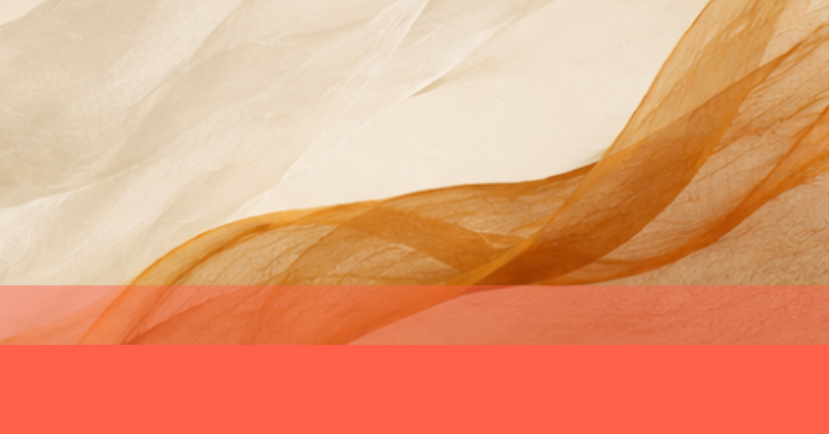 Close-up of layered, sheer, fabric-like material in shades of beige, cream, and orange.