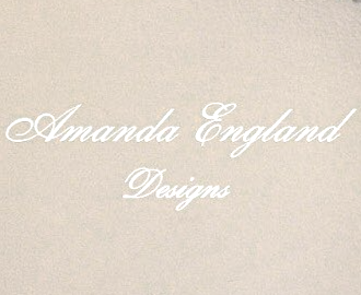 Text reading 'Amanda England Designs' on a plain background.