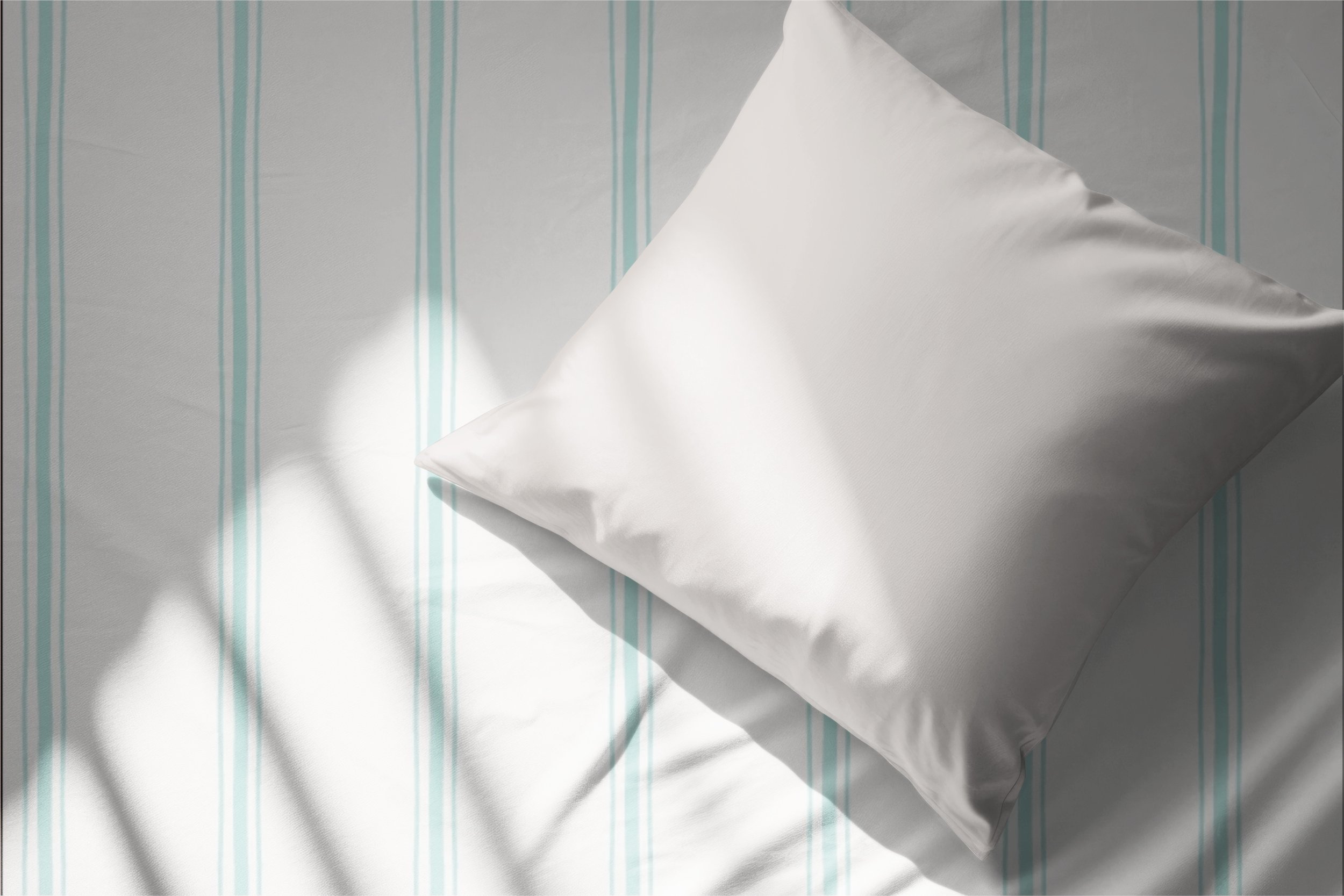 Coastal Wavy Stripes sheet set with hand drawn aqua stripes from the Caicos Beach collection.