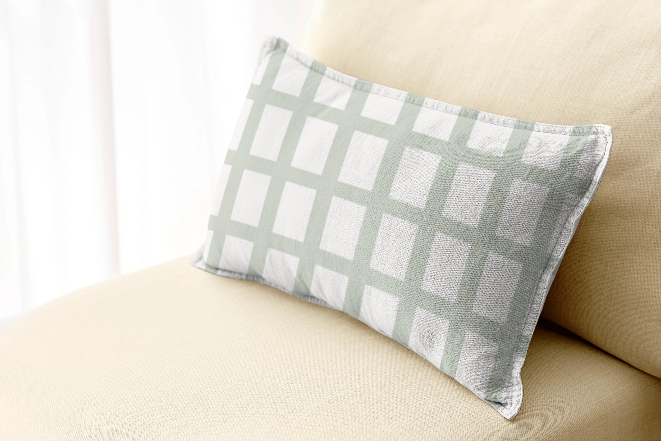 Warm Sage Grid - 
Soft sage checks on warm cream bring a fresh, relaxed touch to your sofa, bed or favourite reading corner.