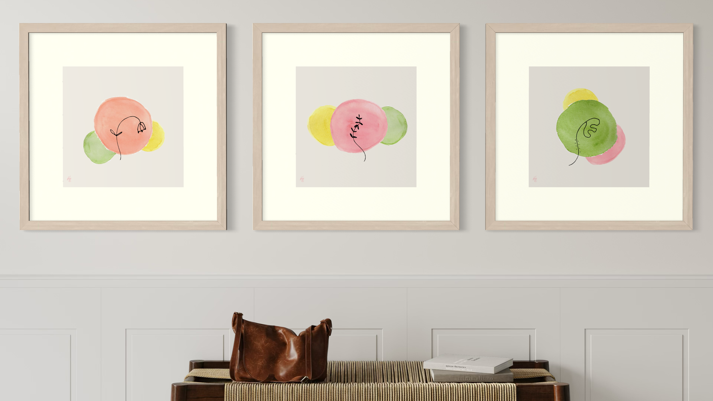 Three framed Ode to Tiny Flowers botanical art prints with watercolor shapes in pink, green and yellow.
