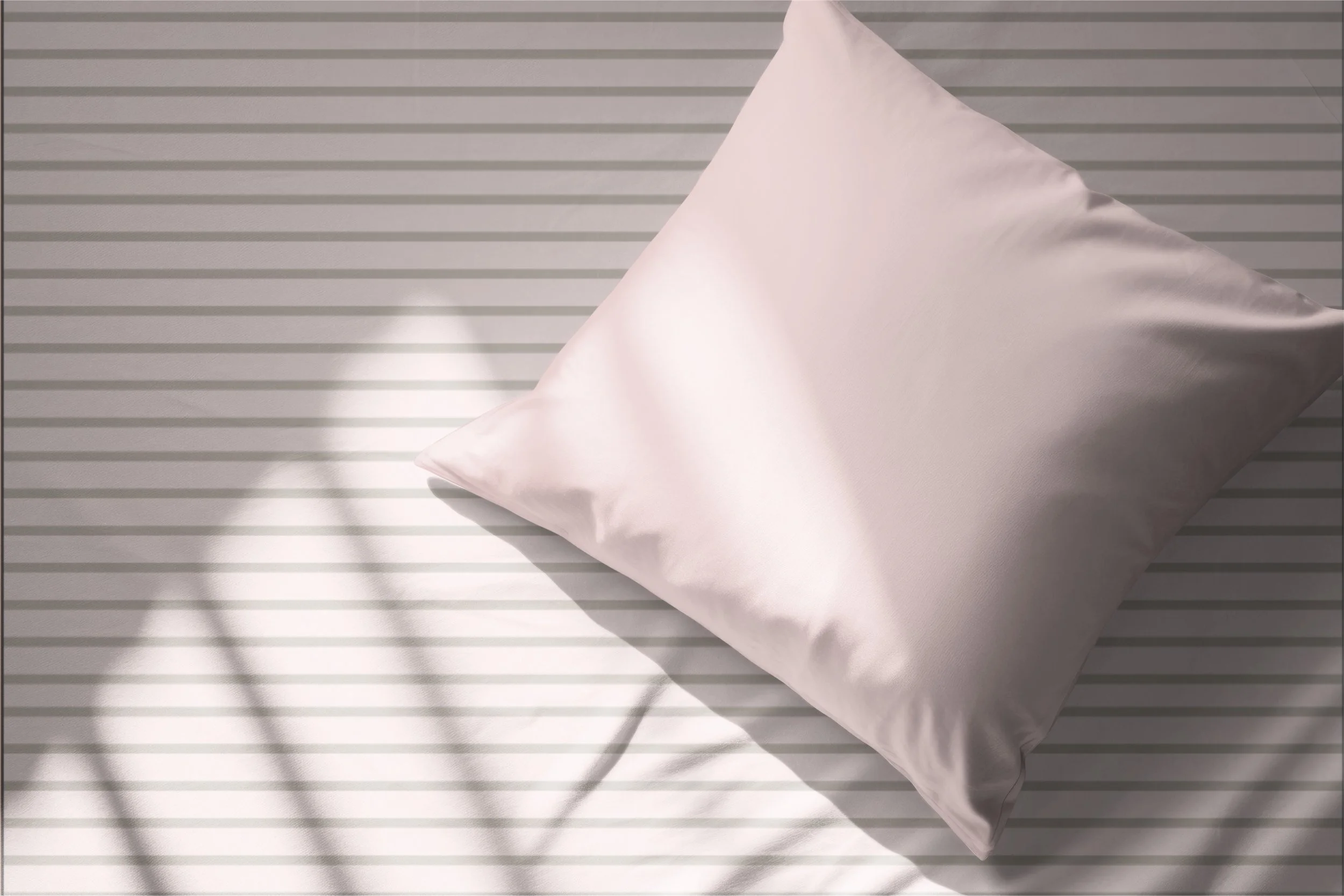 Soft Coastal Stripes sheet set with fine blush pink stripes from the Caicos Beach collection.
