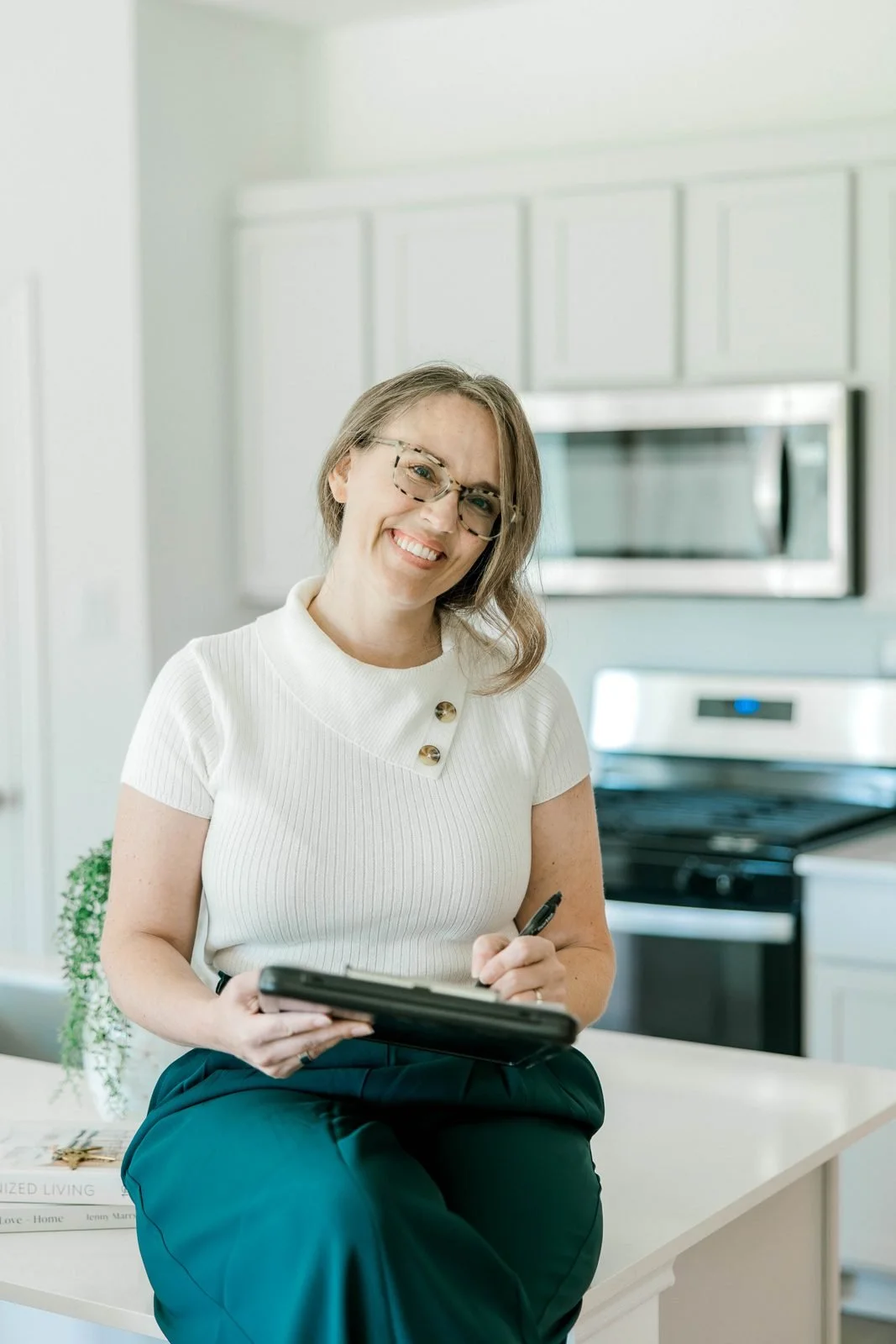 Maggie Hill, General Counsel and Training and Compliance Officer