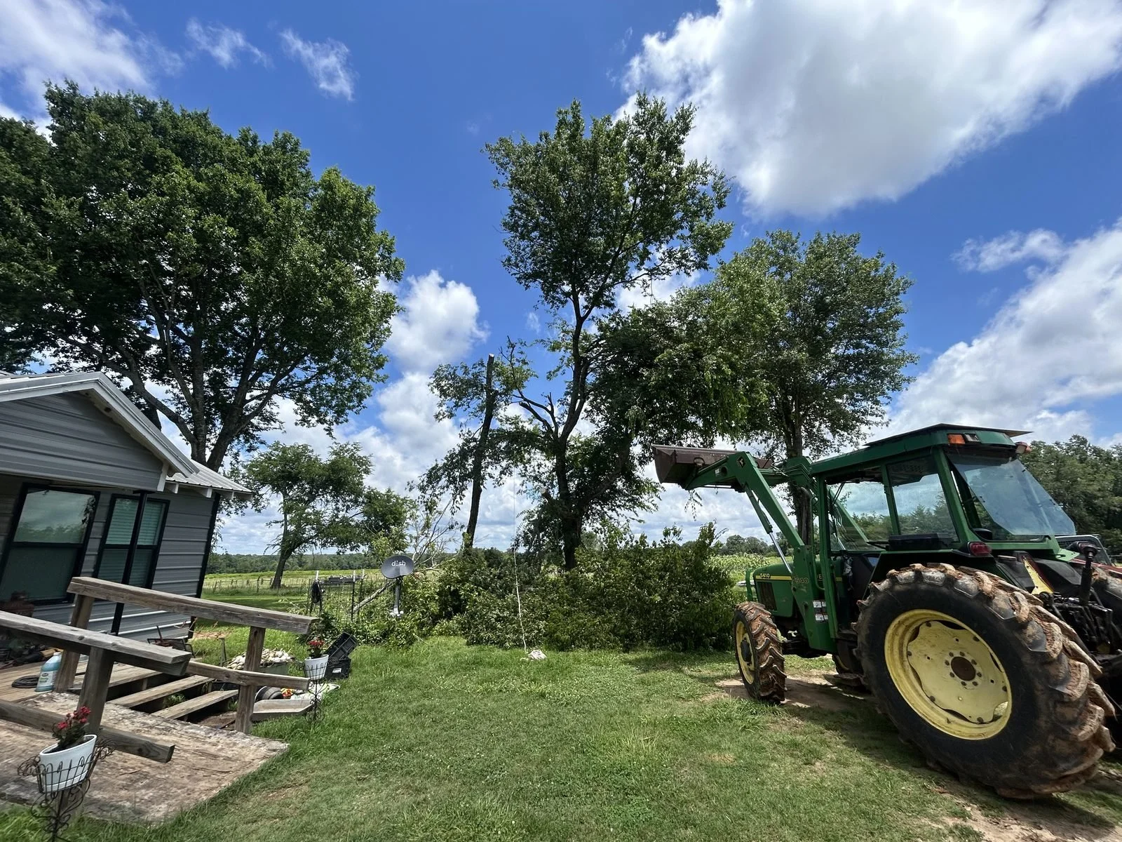 Green tractor on a rural East Texas property