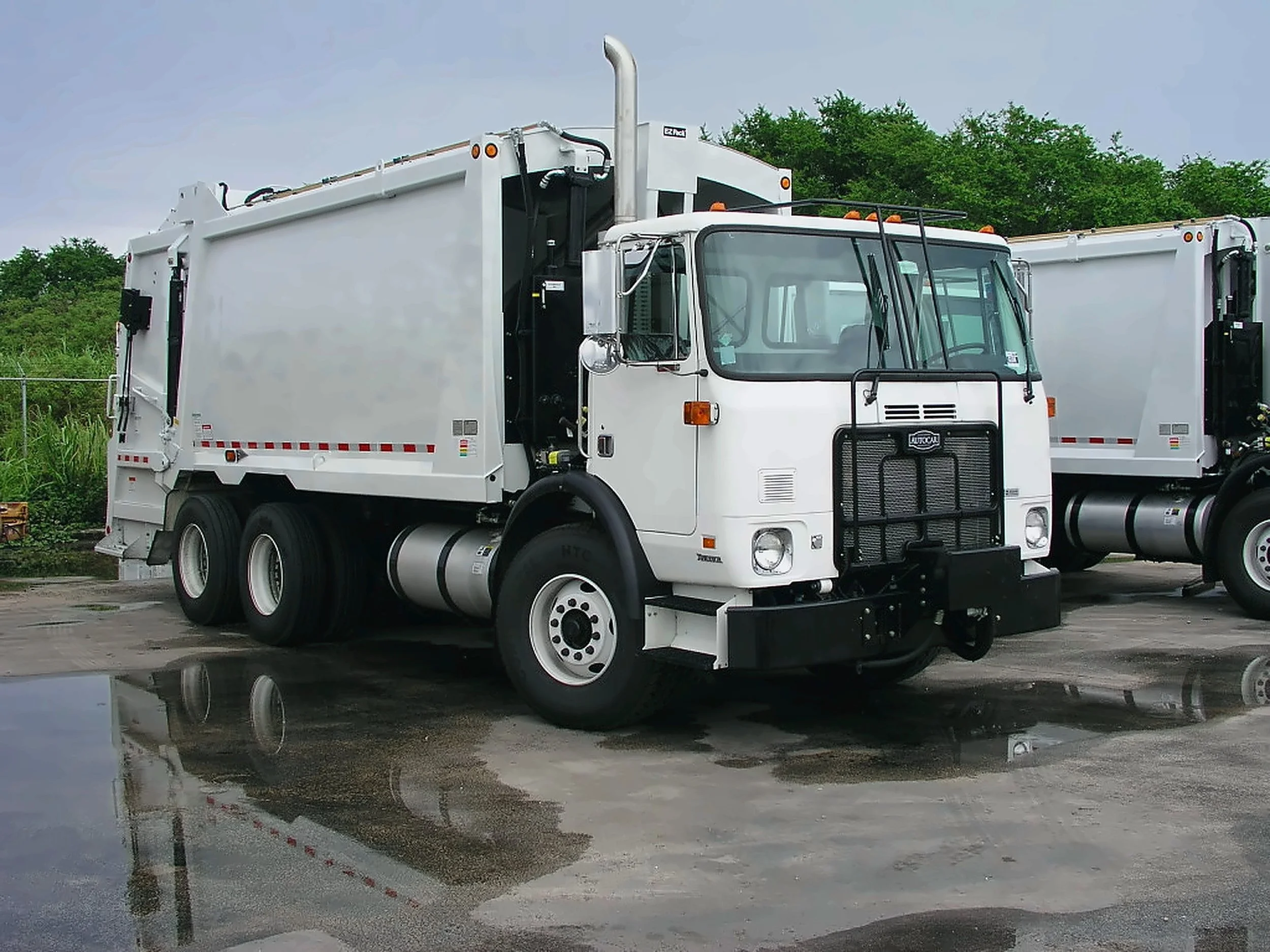 New white residential collection truck for Guam