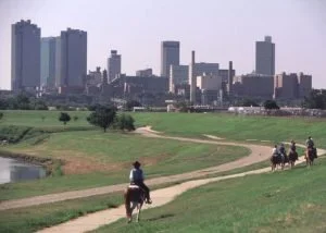 Fort Worth, Texas skyline beyond a riverside trail