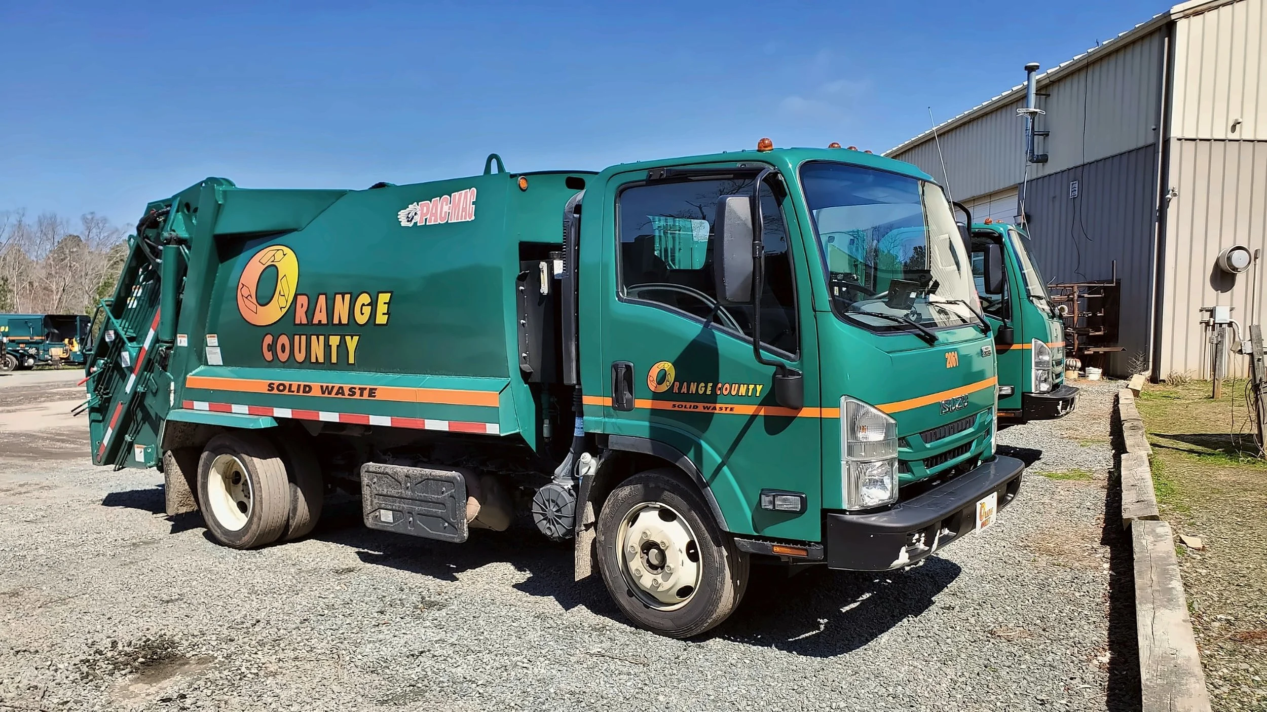 Small rear-load collection truck, Orange County, North Carolina