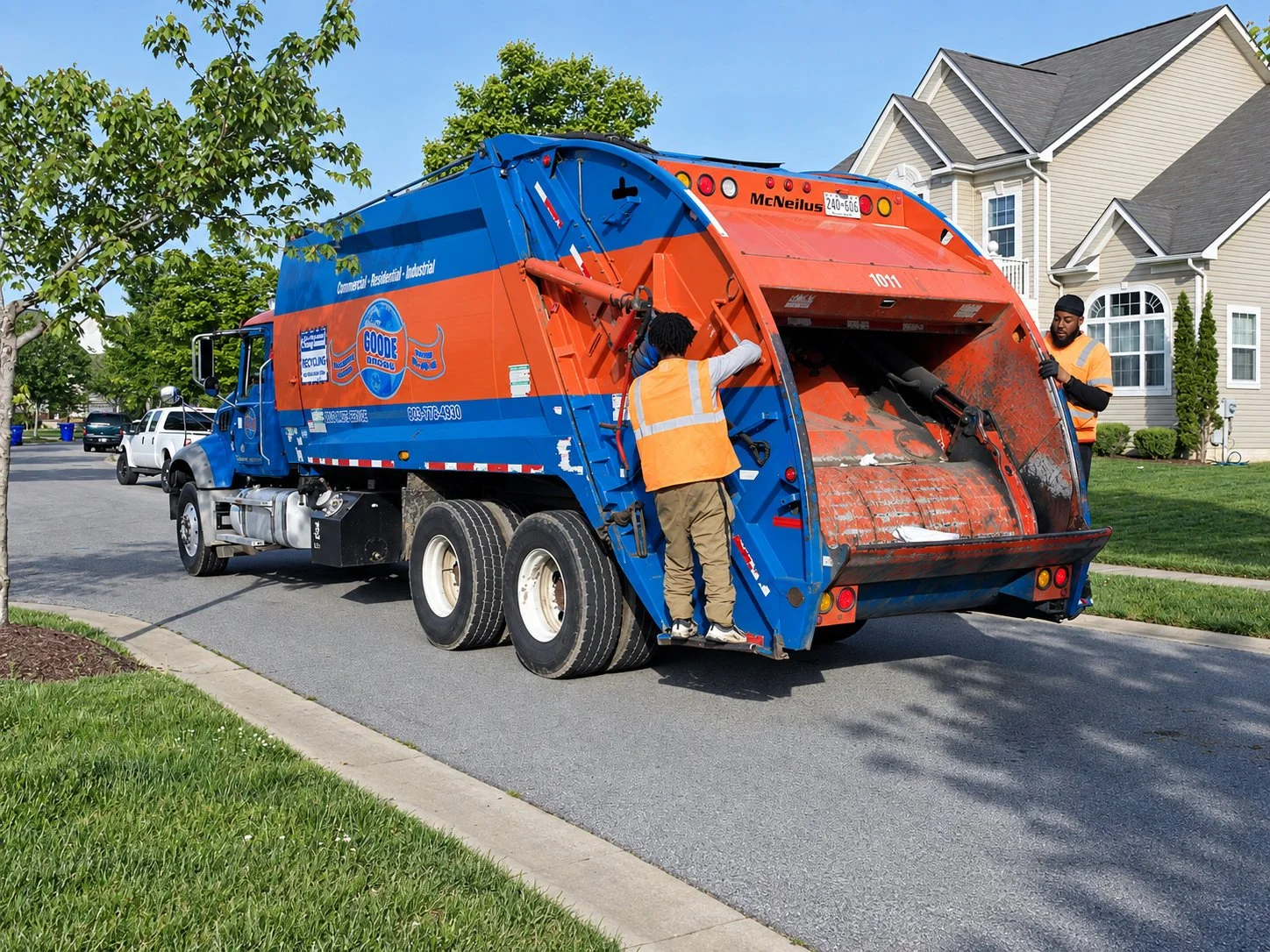 Rear-load collection truck on a residential route in Charles County, Maryland