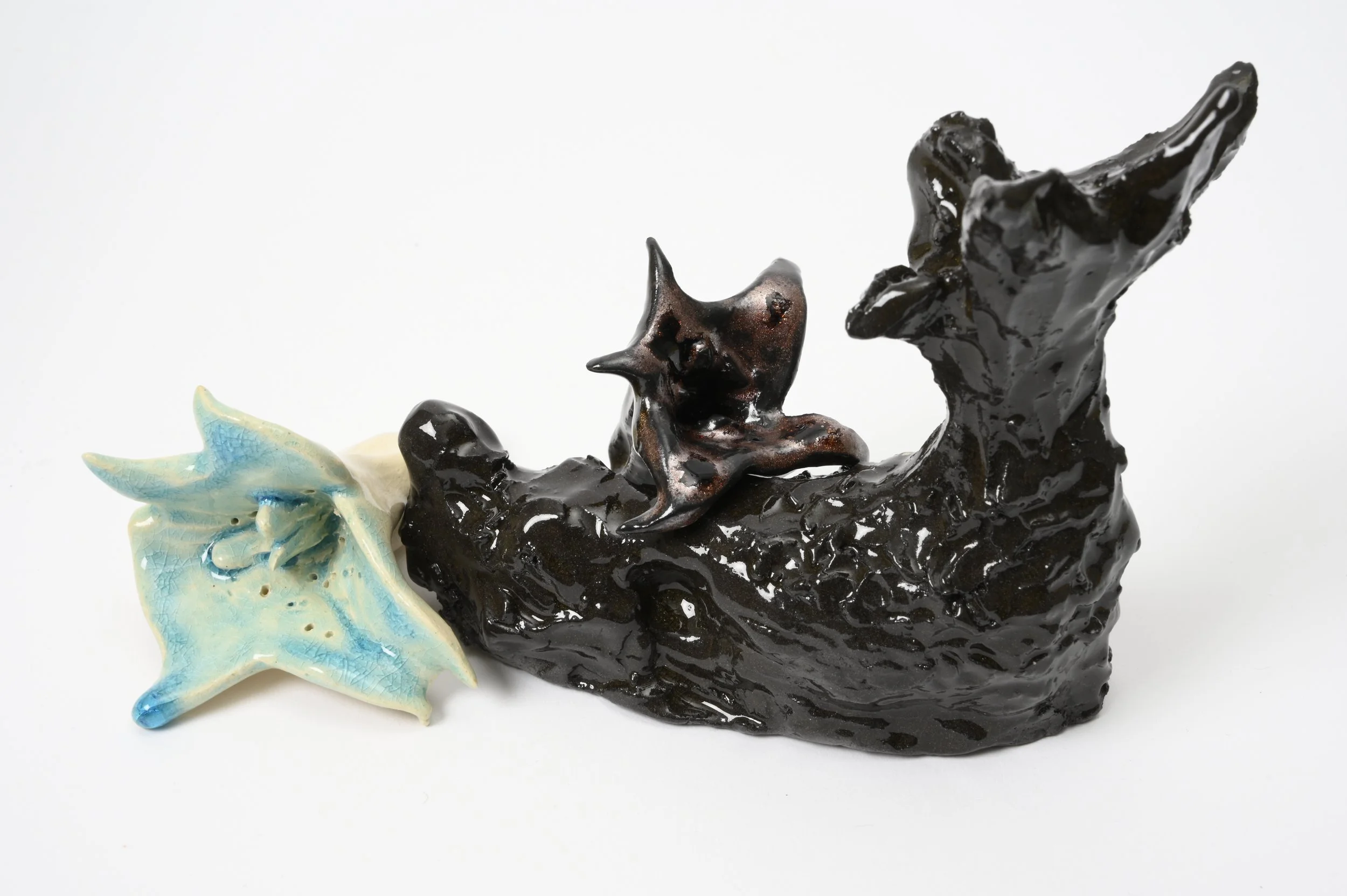 I look how I'm growing into a flower, 2026, glazed ceramics, from left to right : 4x3x8 cm; 10.5x 6.5 x 10 cm; 5.5 x 4.5x 5.5 cm  