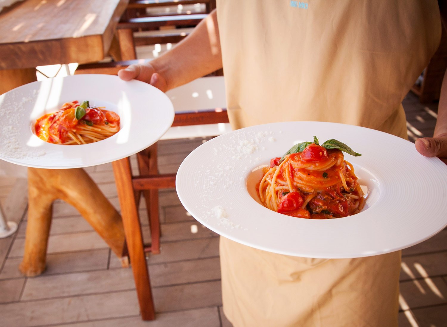 Two plated pasta dishes served together at the restaurant.