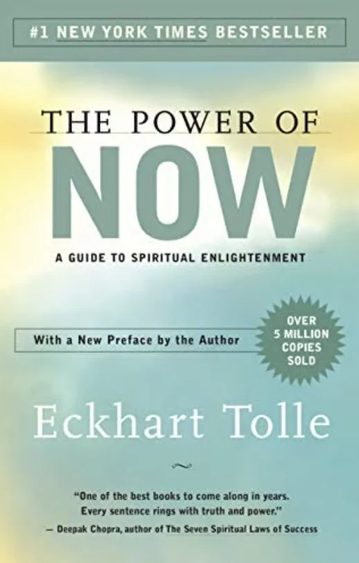 Book cover of 'The Power of Now' by Eckhart Tolle, a guide to spiritual enlightenment, with a teal and yellow background, and a badge indicating over 5 million copies sold.