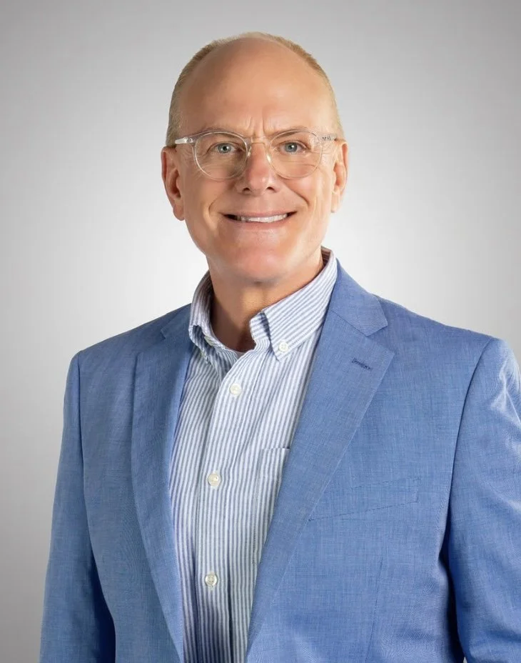 Rick Gregory in a blue suit