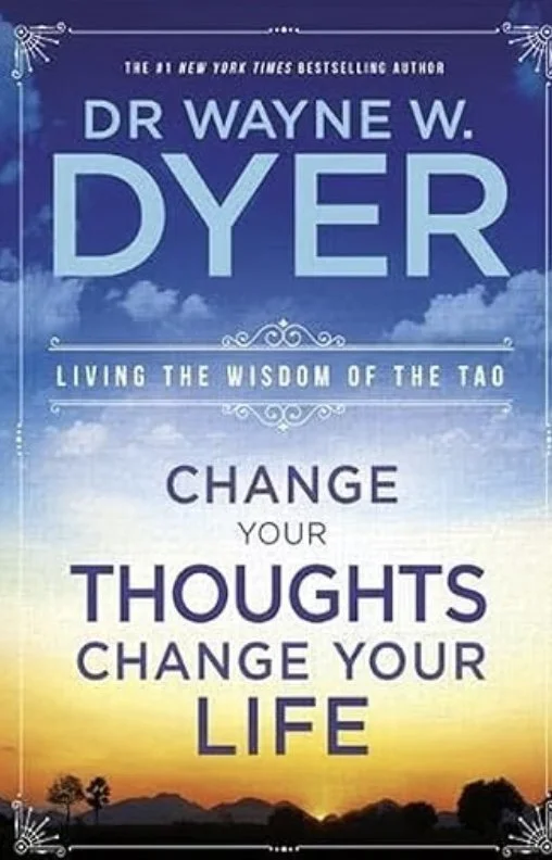 Book cover for "Change Your Thoughts, Change Your Life" by Dr. Wayne W. Dyer, featuring a sky with clouds fading to a sunset landscape with trees and mountains.