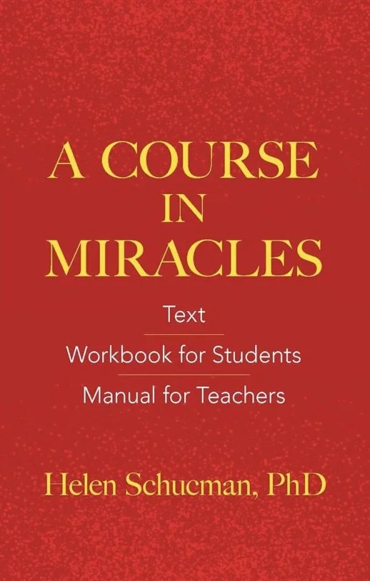 Cover of a book titled "A Course in Miracles" by Helen Schucman, PhD. The cover is red with yellow and white text, and features a subtle dotted pattern.