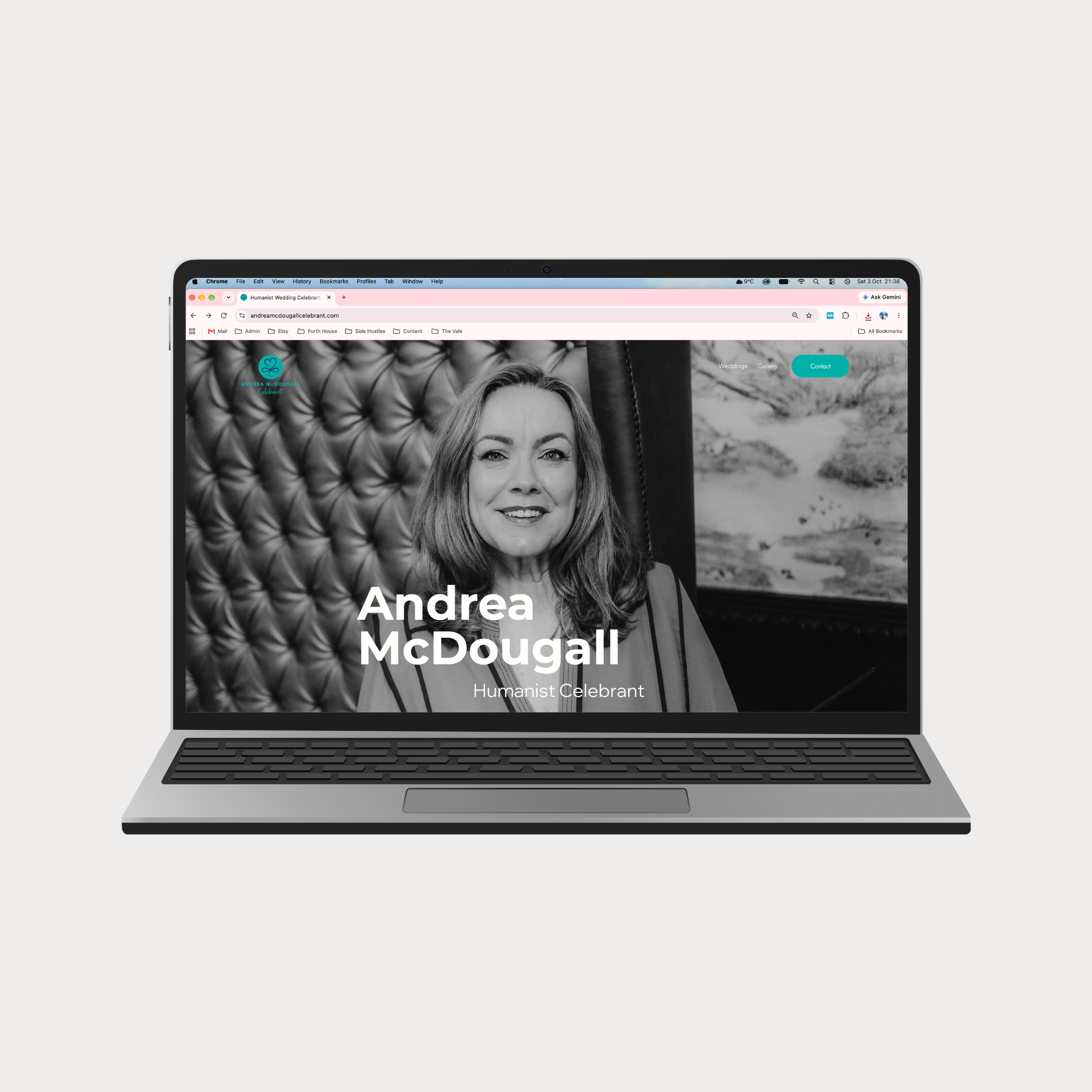 A laptop screen displaying a black-and-white portrait of a woman with the text 'Andrea McDougall' and 'Humanist Celebrant' overlaid on the image.