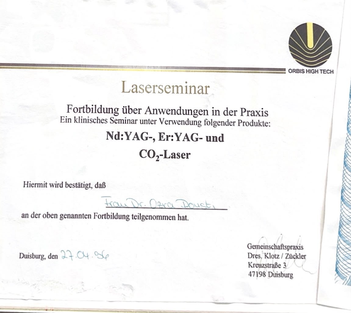 Zertifikat für ein Laserseminar über Anwendungen in der Praxis, mit Fachausdrücken wie Nd:YAG, Er:YAG und CO₂-Laser, unterschrieben und datiert vom 27.04.2006 in Duisburg, mit Logo von Orbis High Tech.