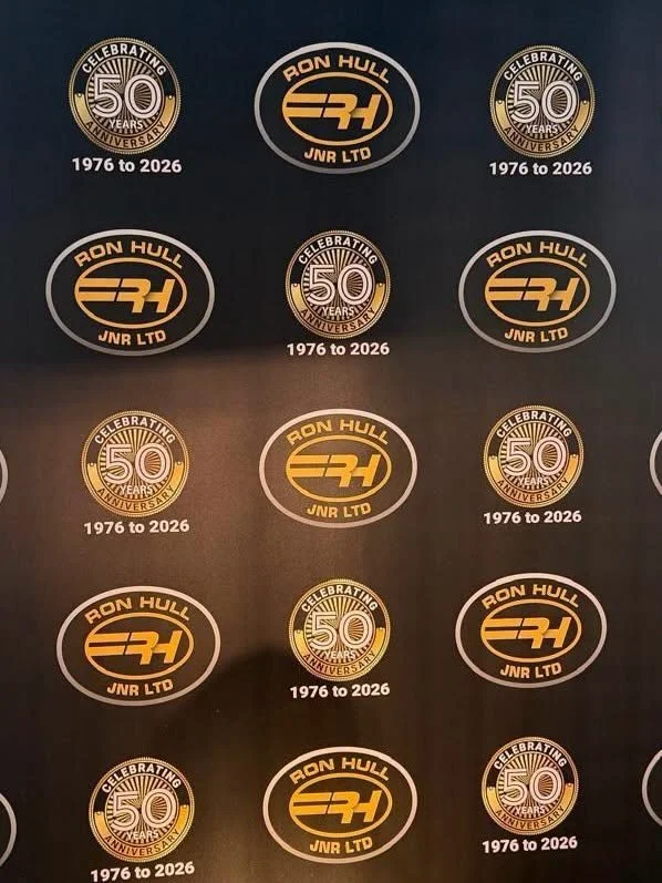 Ron Hull 50th anniversary backdrop with the years 1976 to 2026