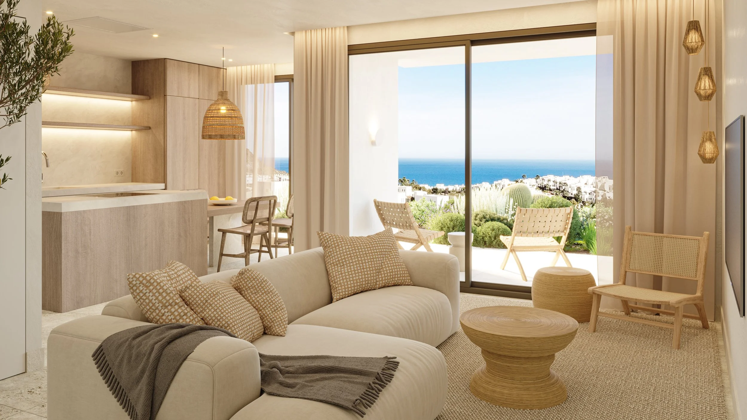 Living room with beige sofa, patterned cushions, wooden side table, and sliding glass doors leading to balcony with outdoor chairs, overlooking ocean and cityscape.