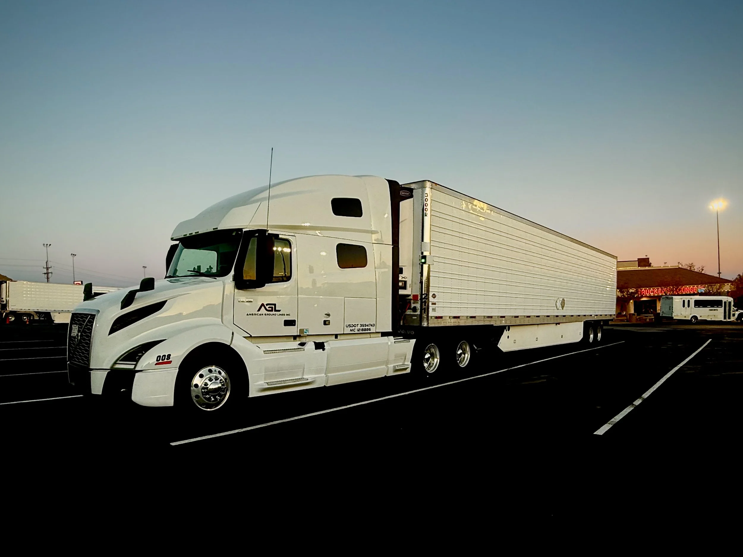 American Ground Lines refrigerated truck providing nationwide temperature-controlled transportation.